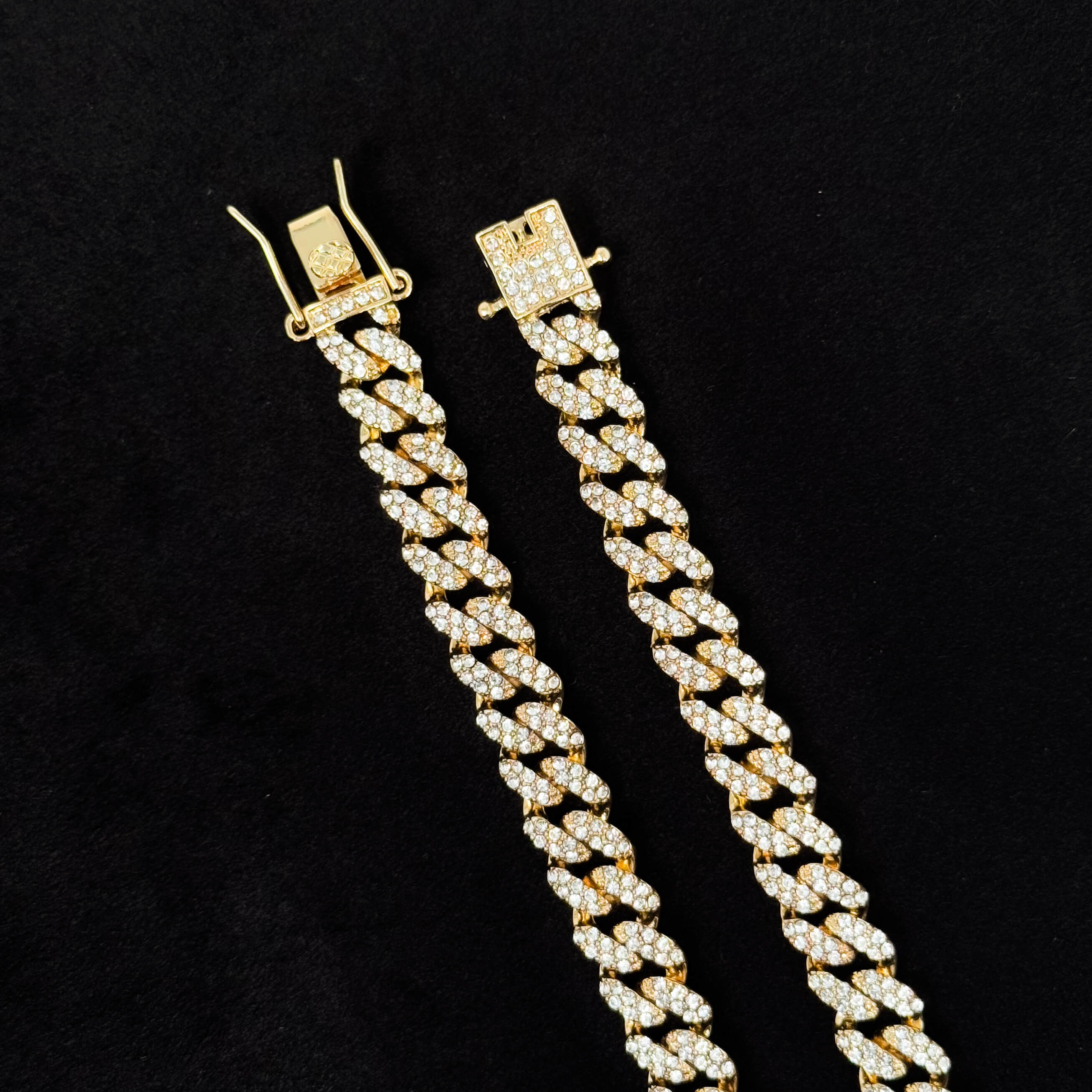 Close-up of 9mm Iced Out Cuban Chain gold clasp detail showing pavé CZ diamonds and lock mechanism.