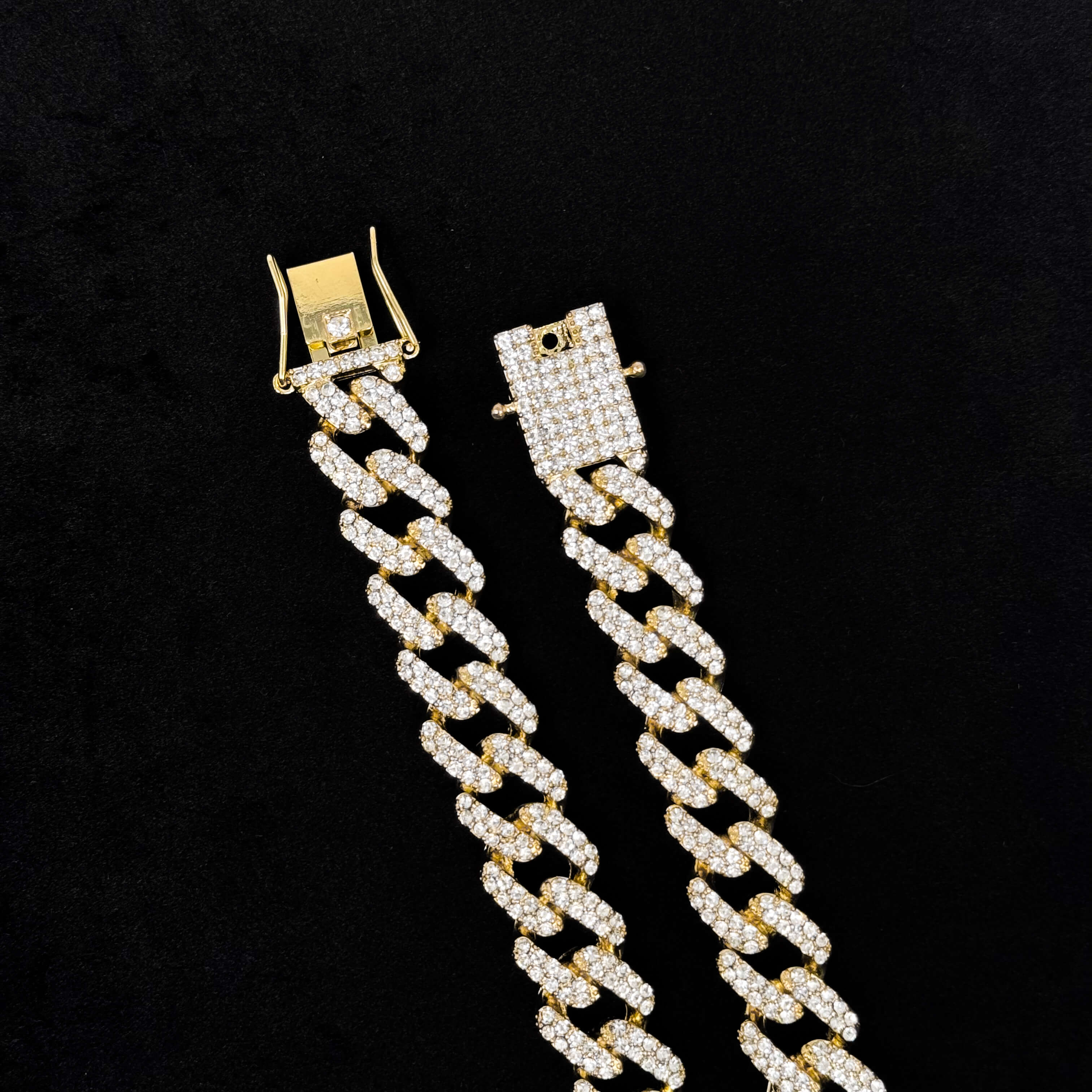 Close-up of 15mm Iced Out Cuban Chain gold iced clasp showing pavé CZ lock and wide Cuban link design.
