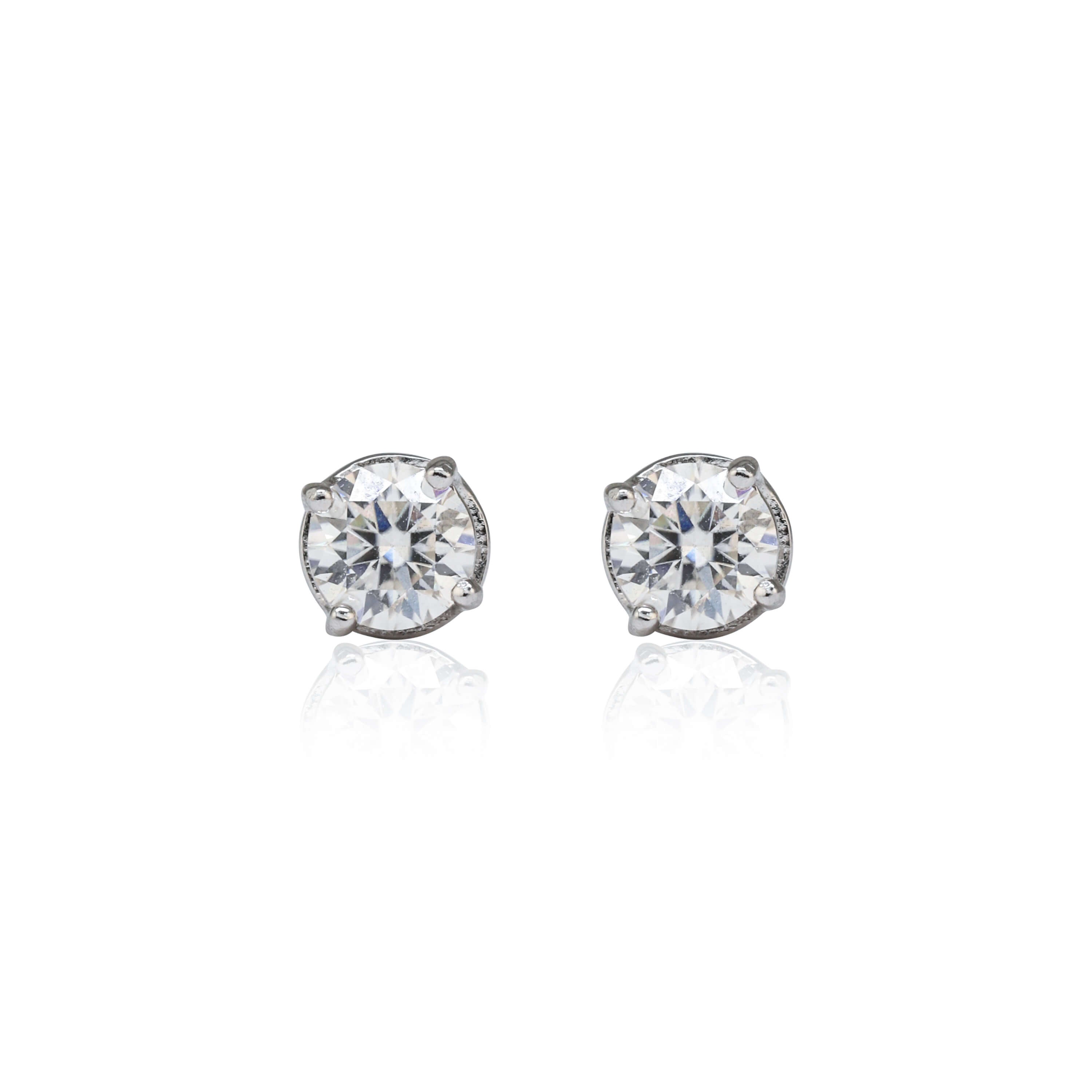 5mm round Moissanite solitaire earrings with 1.1ct diamond studs in sterling silver, front view.