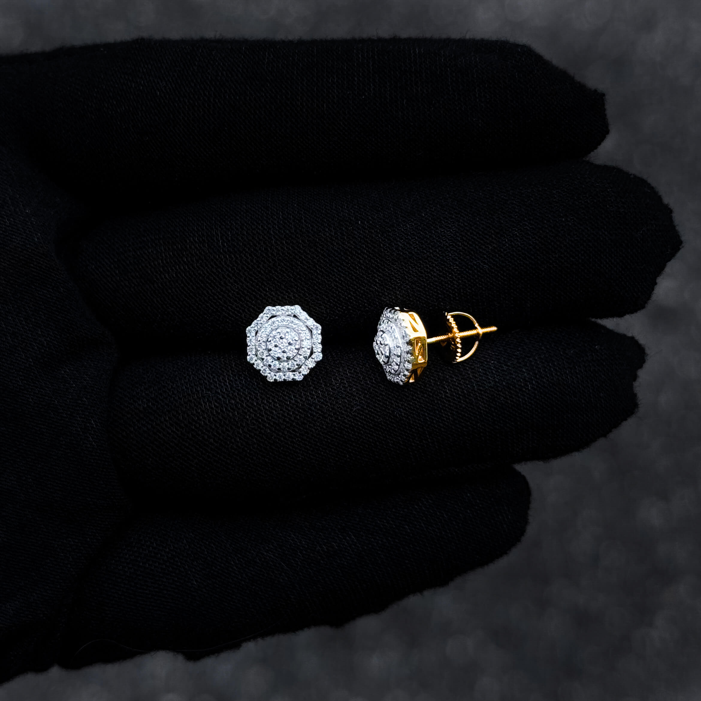 10mm moissanite cluster diamond stud earring with gold screw-back post shown on glove.