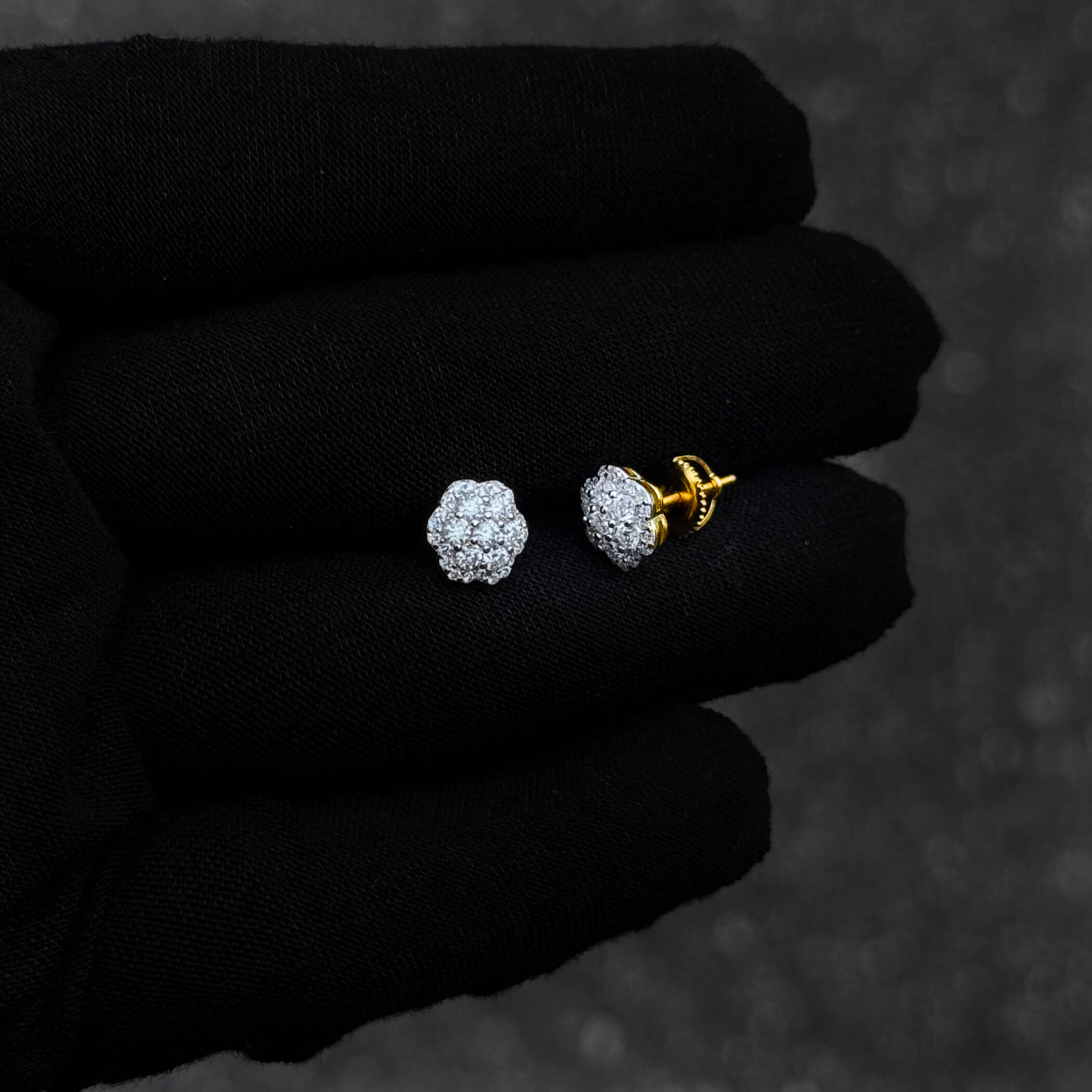 Side and front view of 9mm moissanite flower cluster diamond studs in sterling silver.