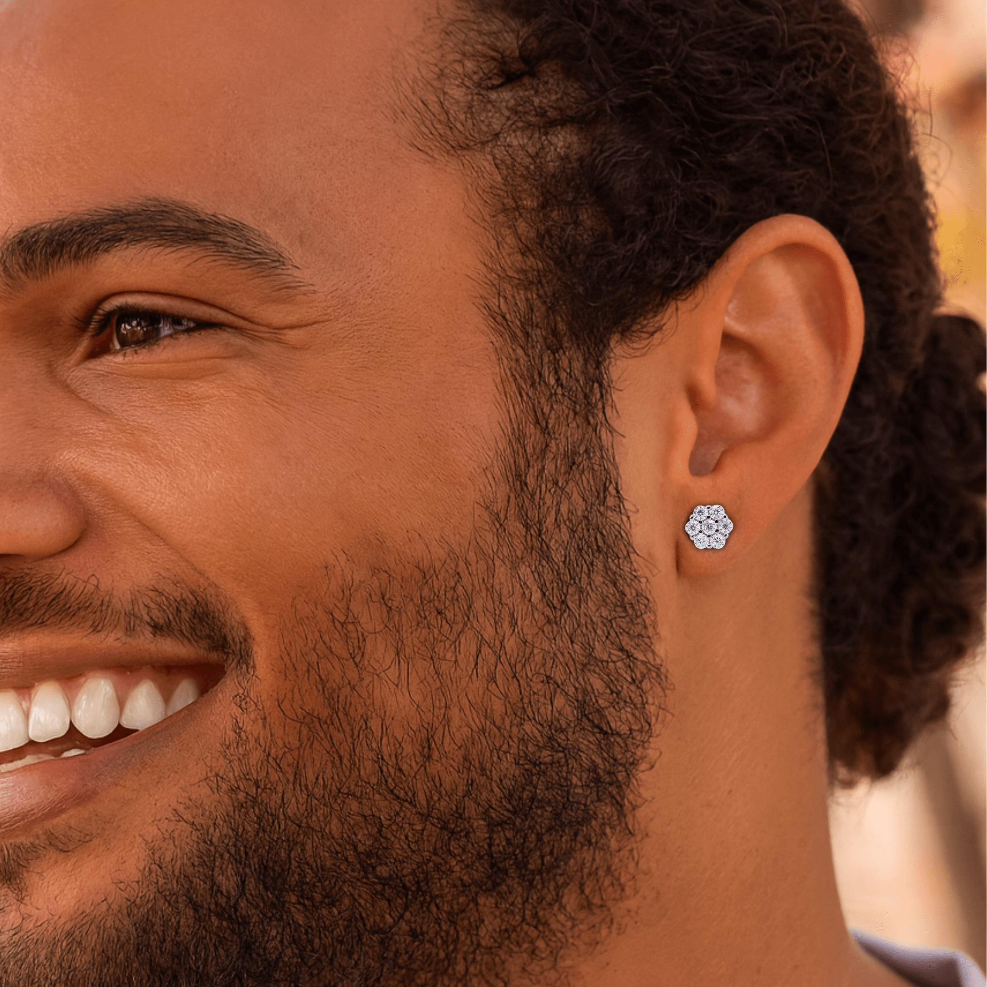 5mm moissanite cluster stud earring worn on ear, showcasing sparkle and sterling silver.
