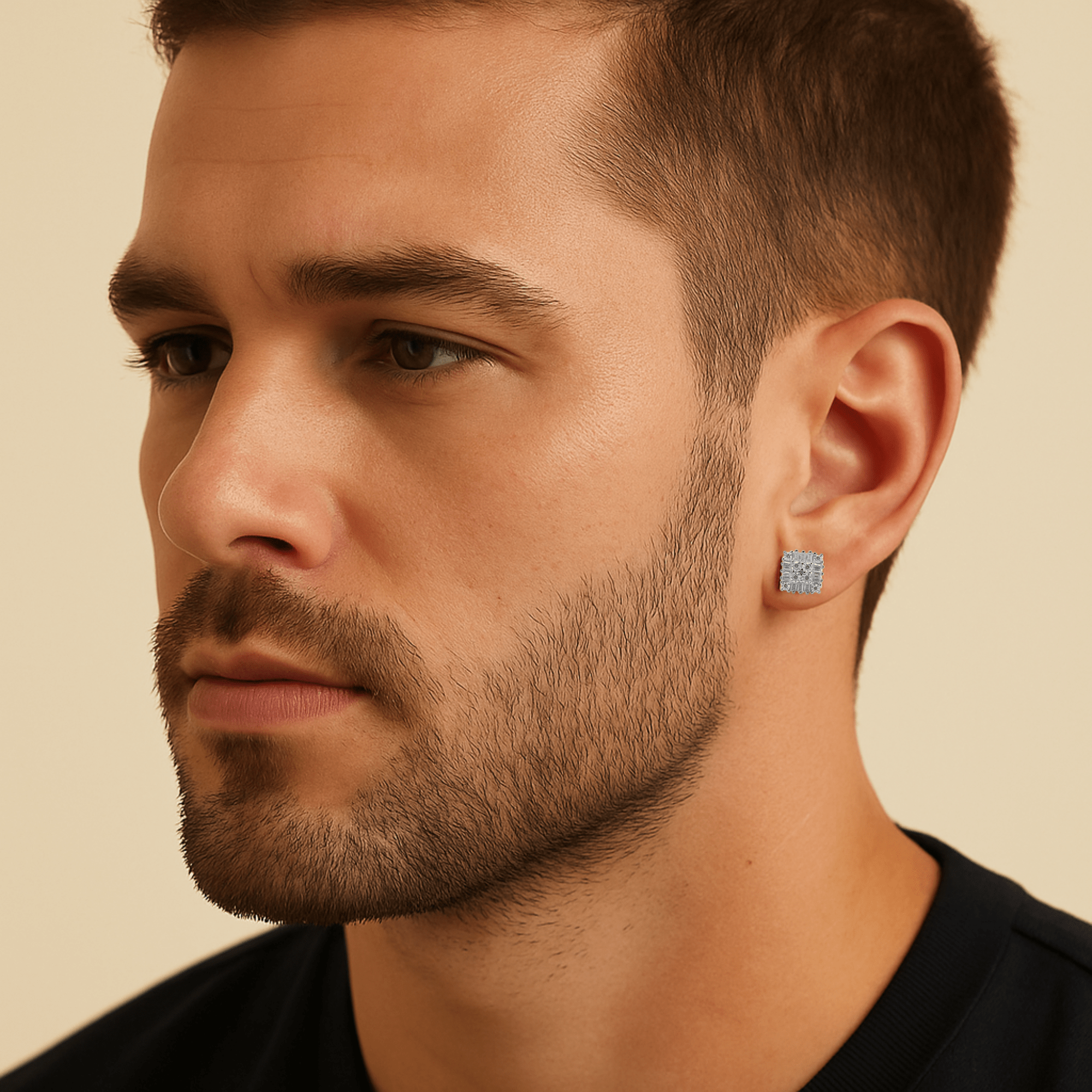 Men’s 7mm square moissanite cluster earrings in silver worn as bold diamond stud accessory.