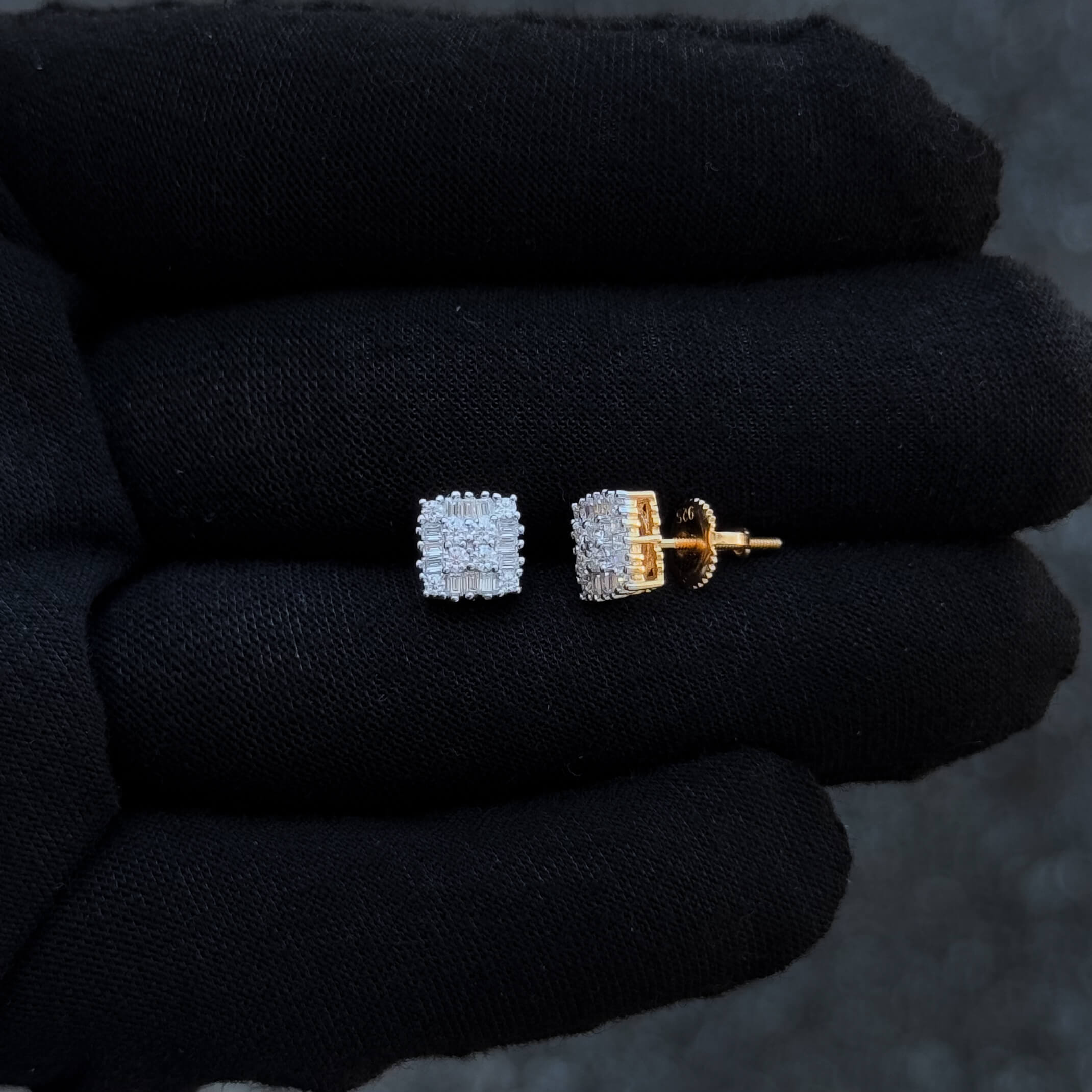 Side view of 7mm moissanite square cluster earrings with gold setting and screw-back post.