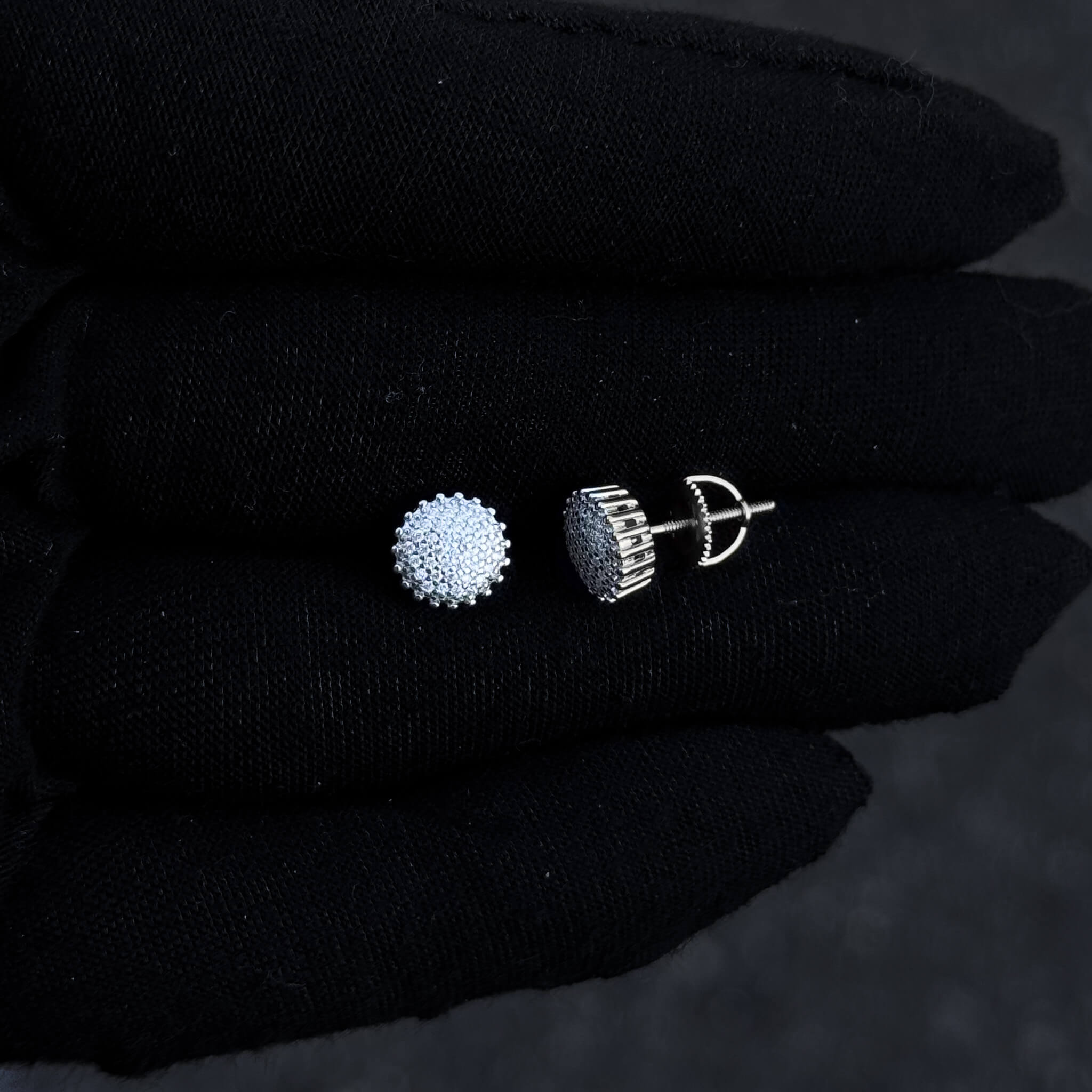 Side view of 8mm round moissanite cluster diamond studs in sterling silver with screw-back post.