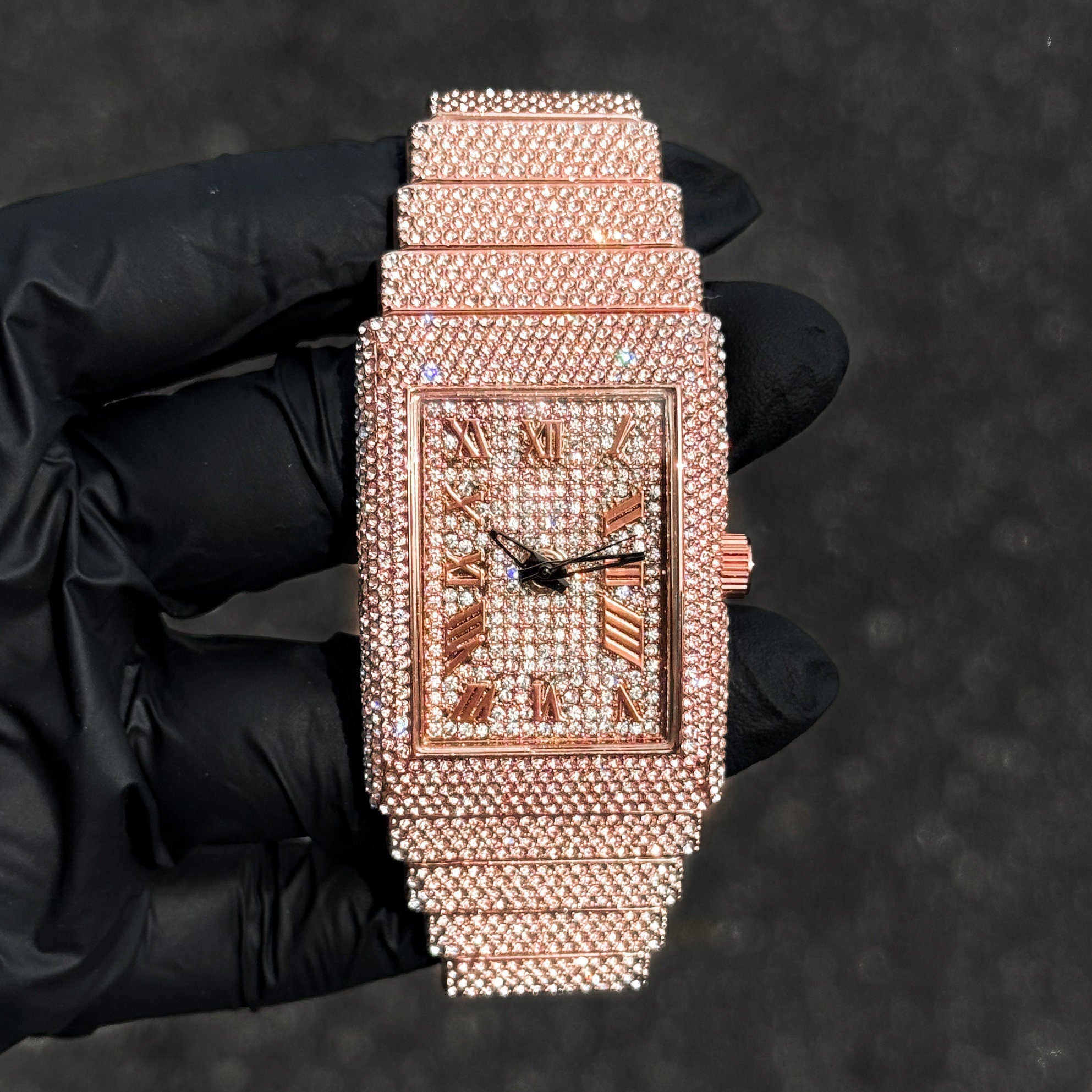 Rose gold Women's 33mm rectangle diamond watch with full iced dial and chandelier band.