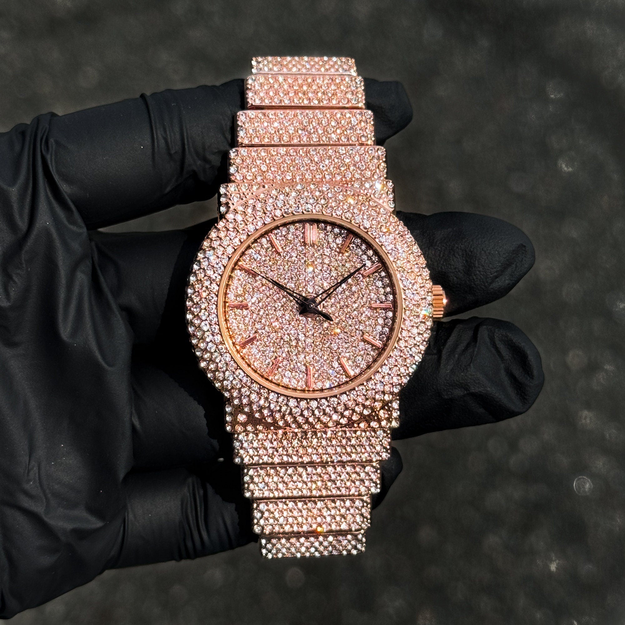 Rose gold Women's 40mm luxury diamond watch with full crystal dial and iced-out bracelet.