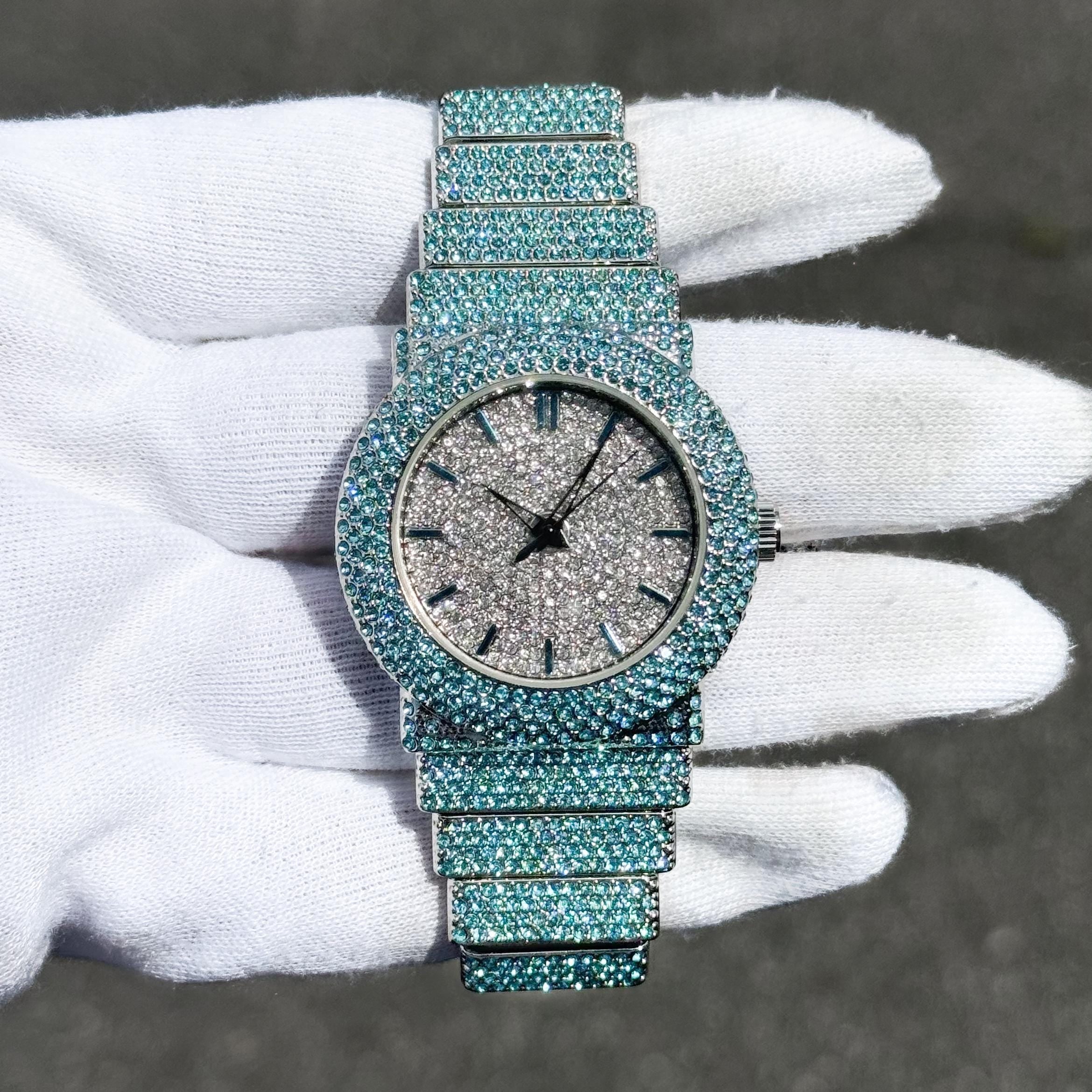 Women's 40mm aqua iced diamond watch with full crystal bezel, shimmering dial and iced band.