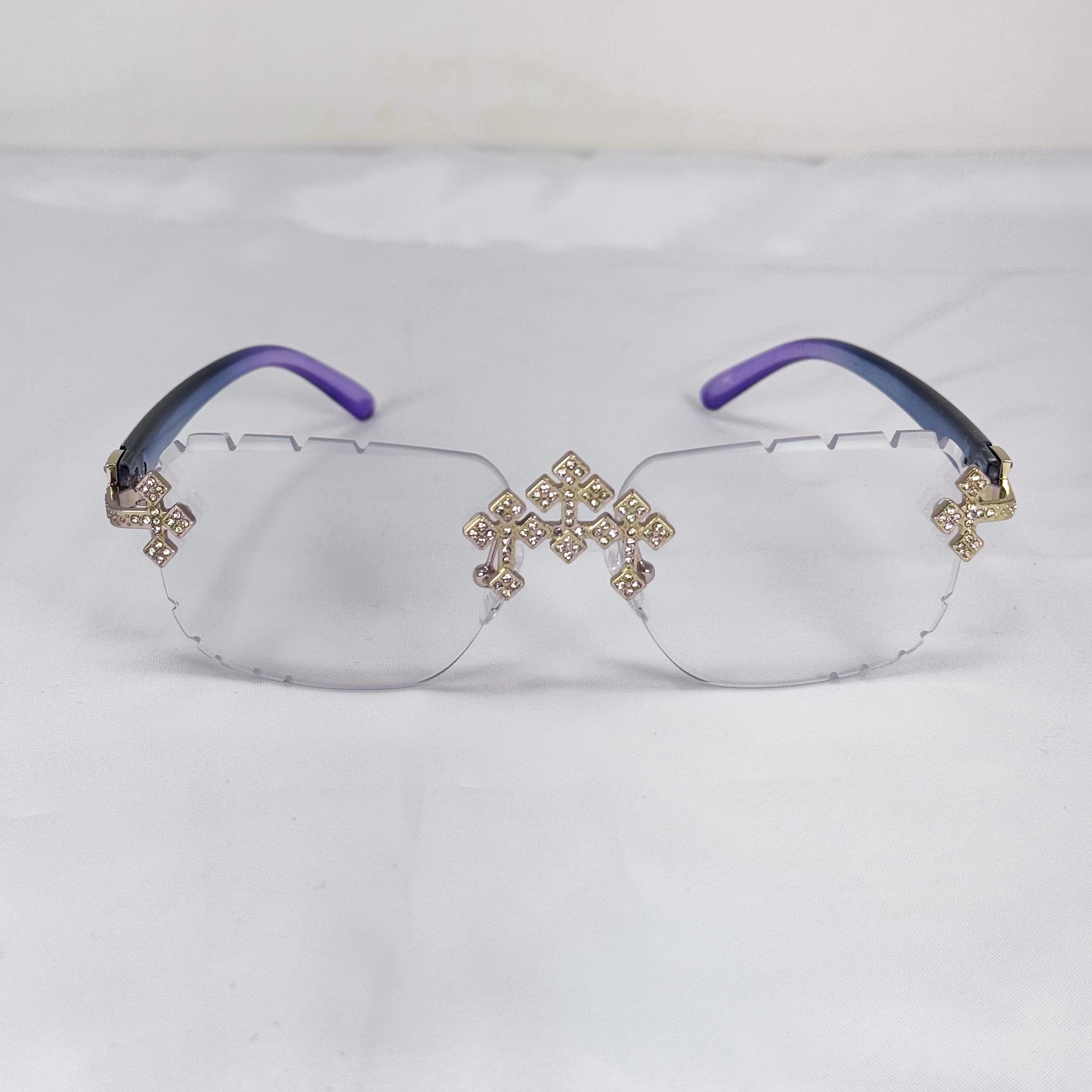 Clear Iced Triple Cross Sunglasses with gold cross accents and blue-purple ombré temple arms.