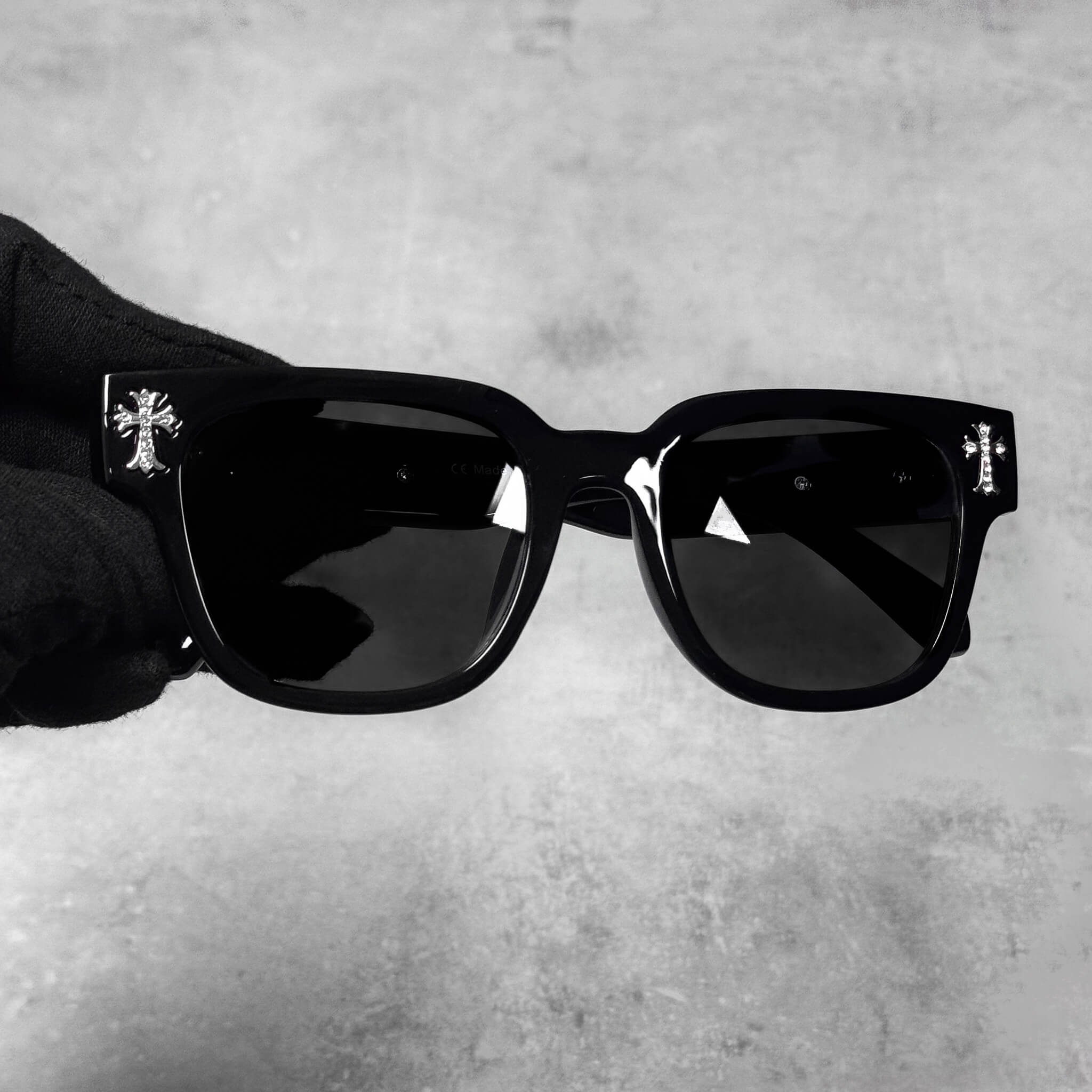 Front view of black Triple Cross Chrome Inspired Sunglasses with silver chrome cross accents.