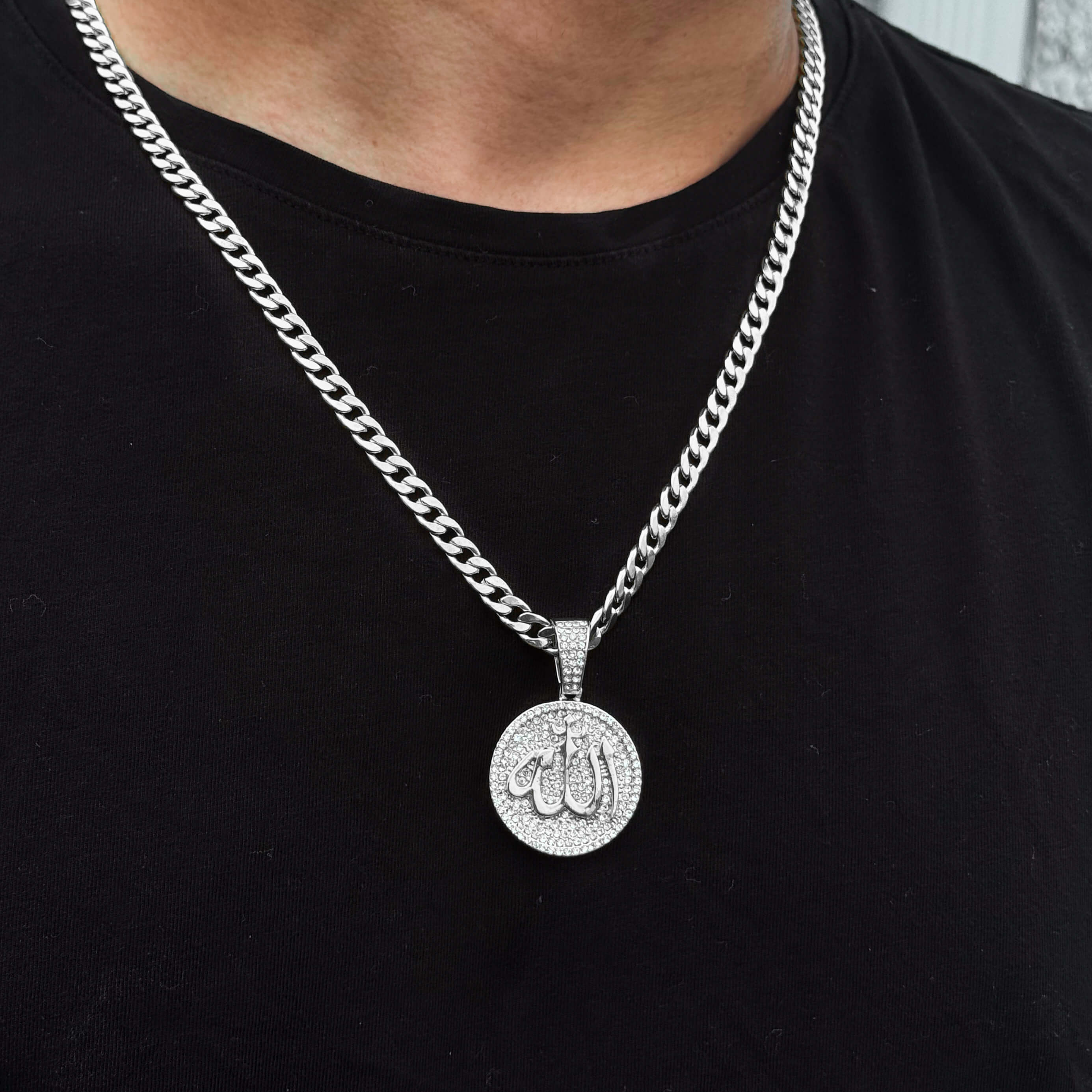 Silver Men's 22mm Iced-Out Medallion Allah Pendant with 6mm Cuban Chain on black shirt.