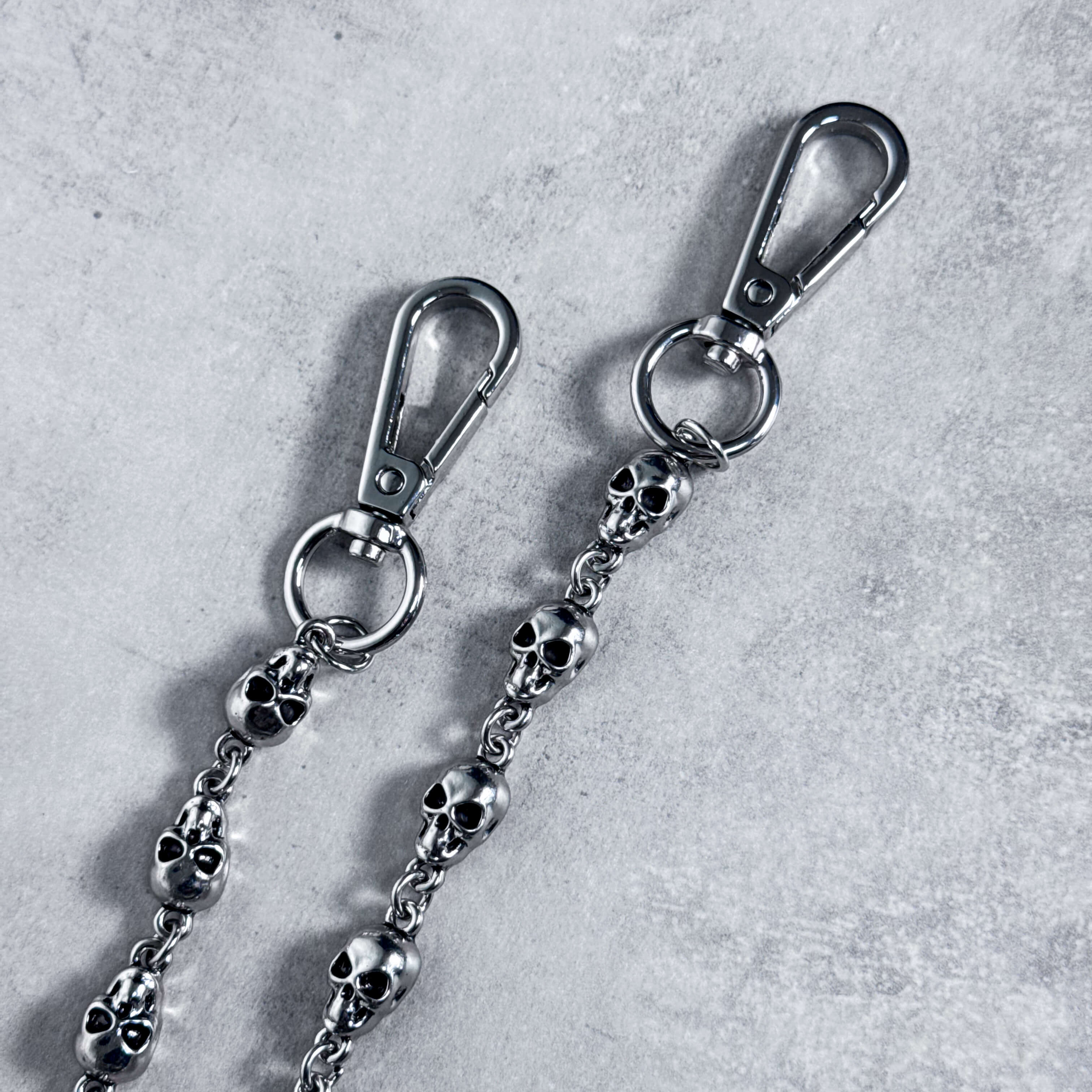 Close-up of 9mm Skull Link Pant Chain showing polished silver skull links and sturdy metal clasp hardware.