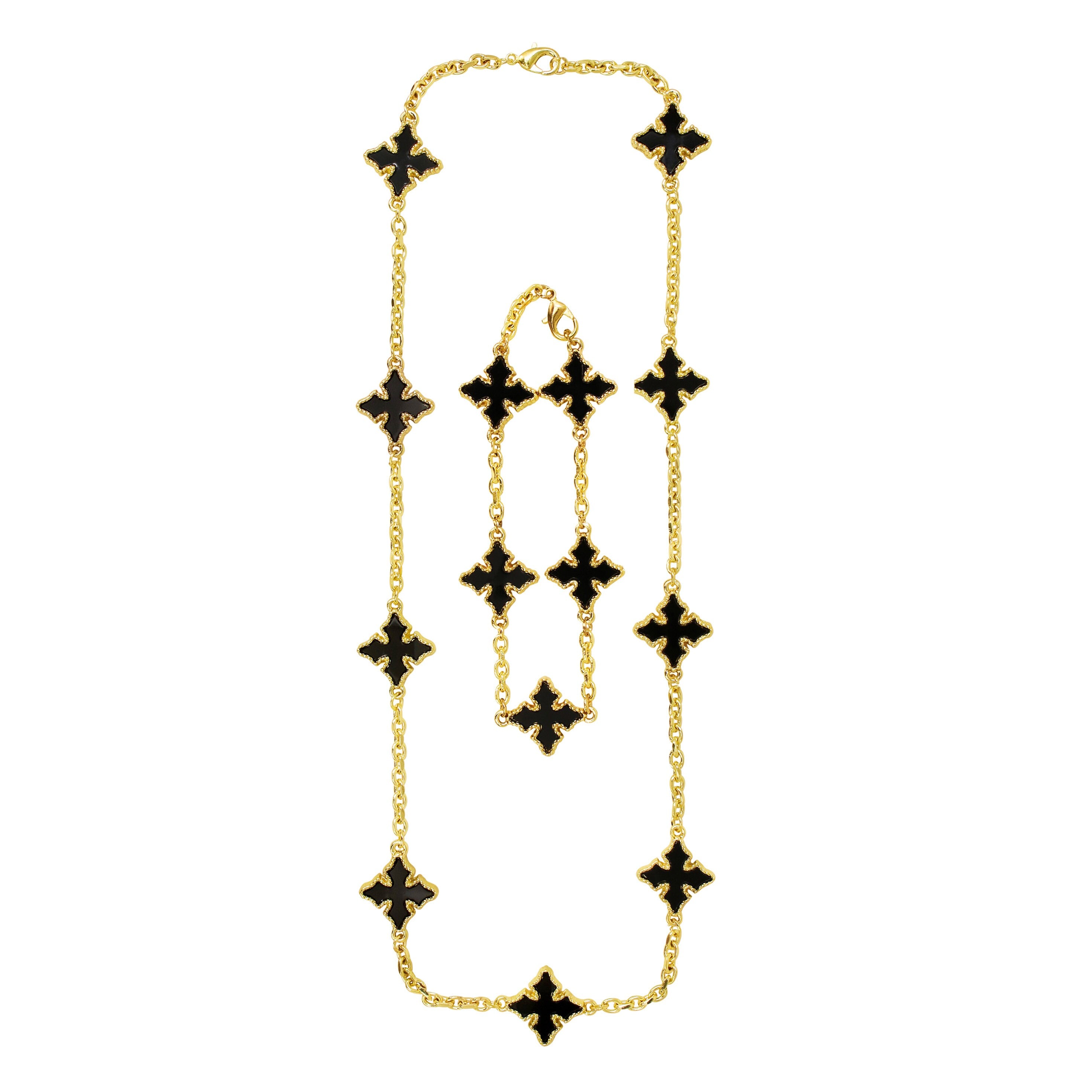 Gold men’s multi-cross necklace and bracelet set with black enamel double-sided cross charms.
