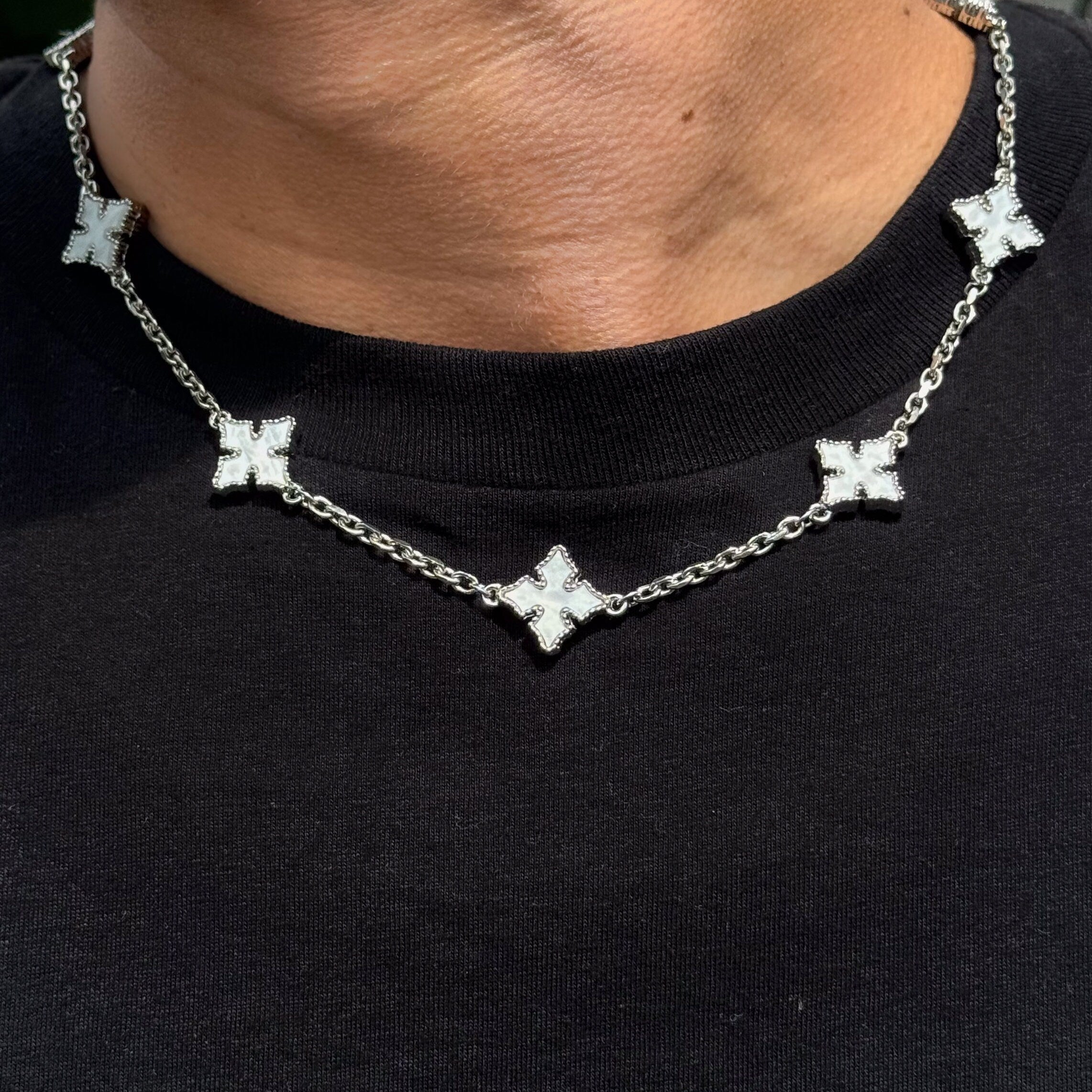 Multi Cross Chrome Inspired Chain - MOP in silver featuring white mother-of-pearl cross charms, close-up worn look.