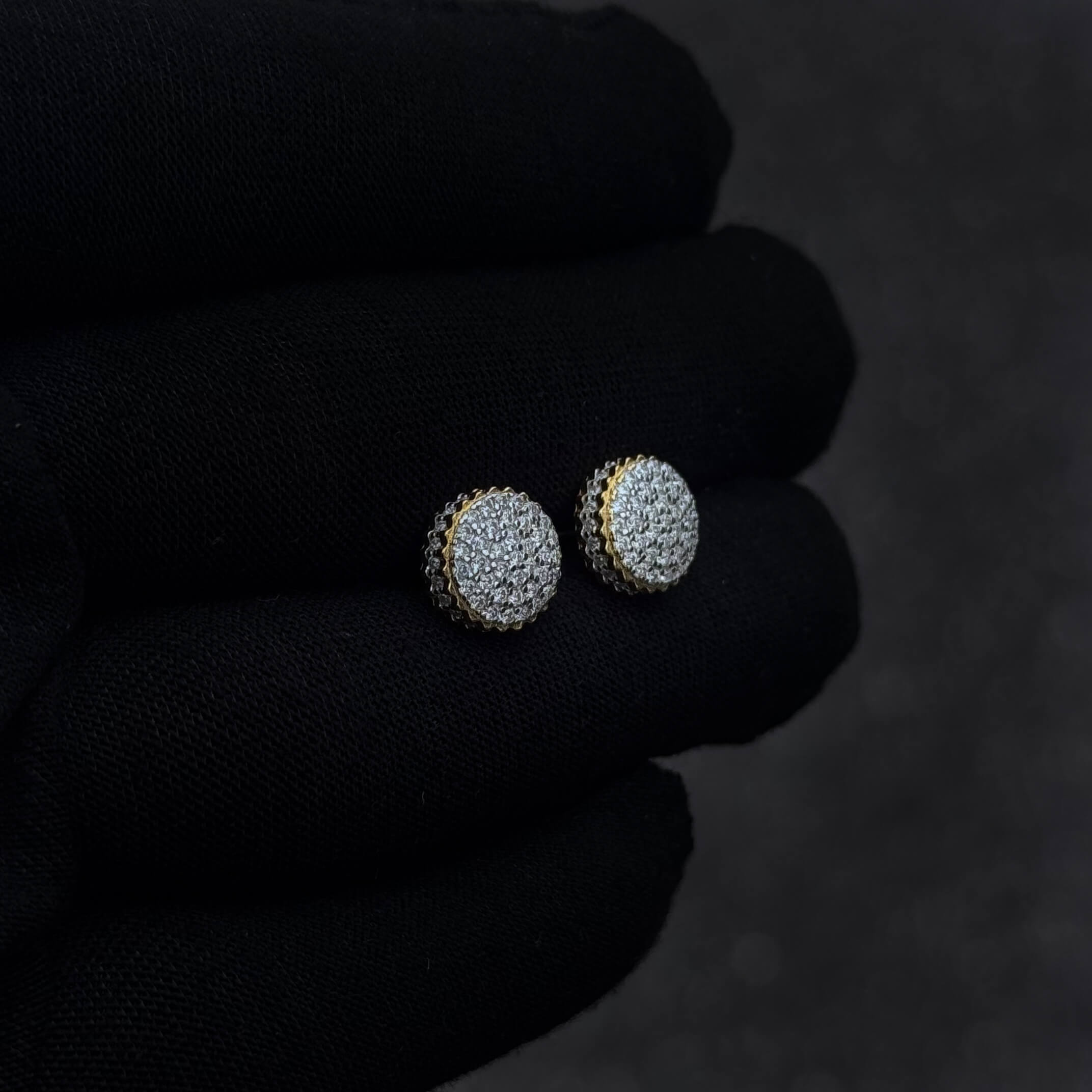 Side-angle view of 9mm gold moissanite cluster earrings with raised pavé dome and detailed scalloped edges.