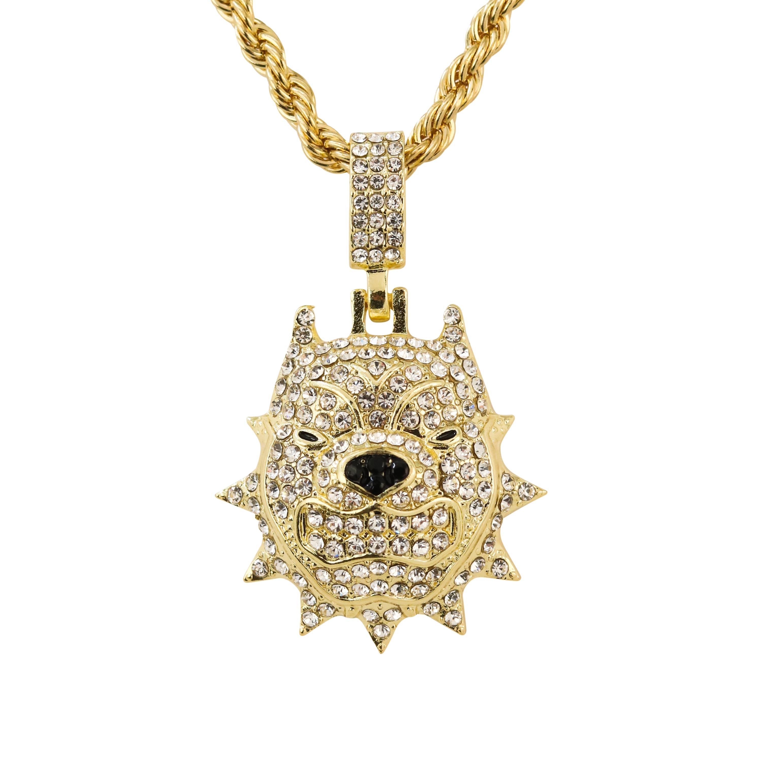 Gold iced out dog pendant with spiked face detailing and clear stones on rope necklace.