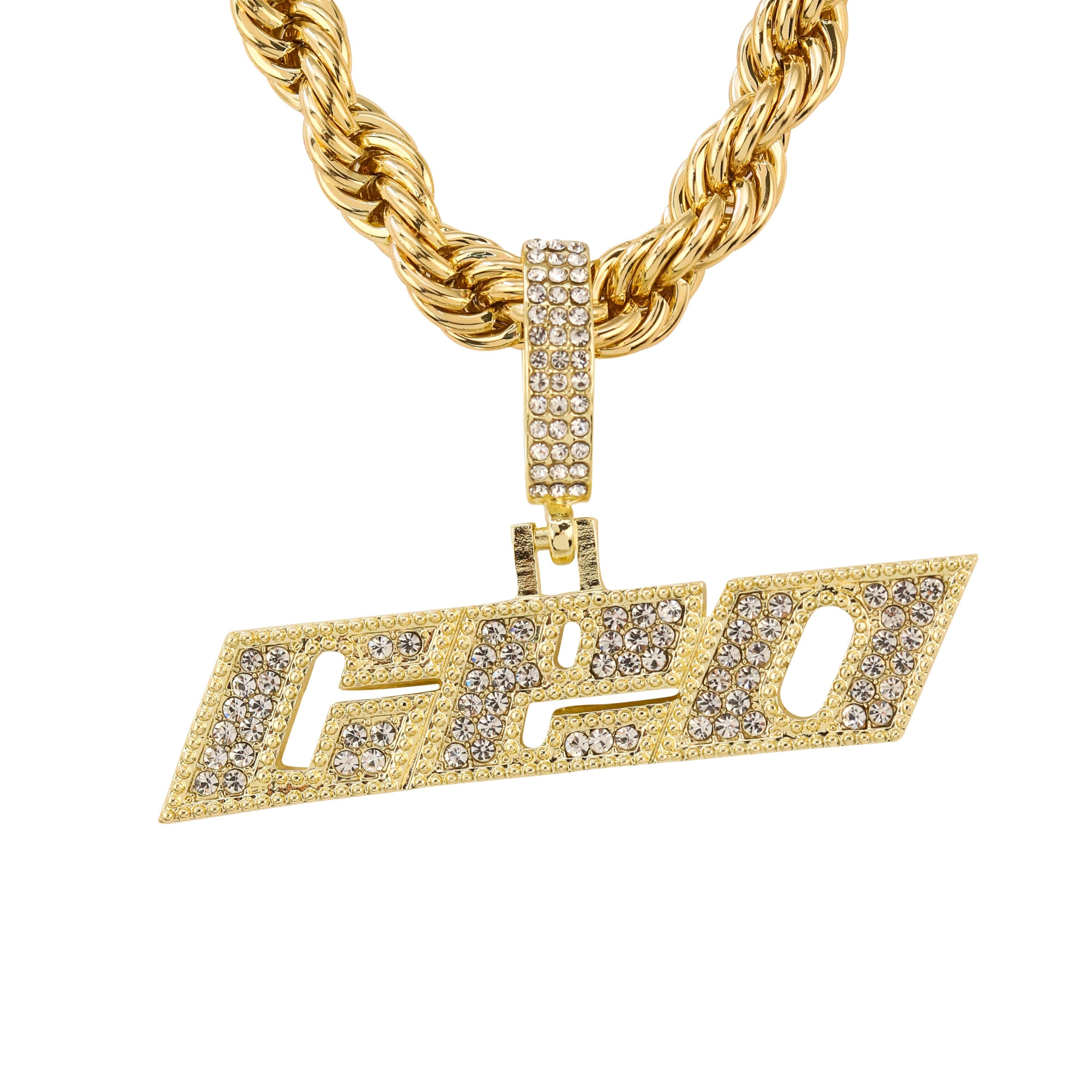 Close-up gold iced out CEO pendant with crown design, large men's hip hop jewelry piece.