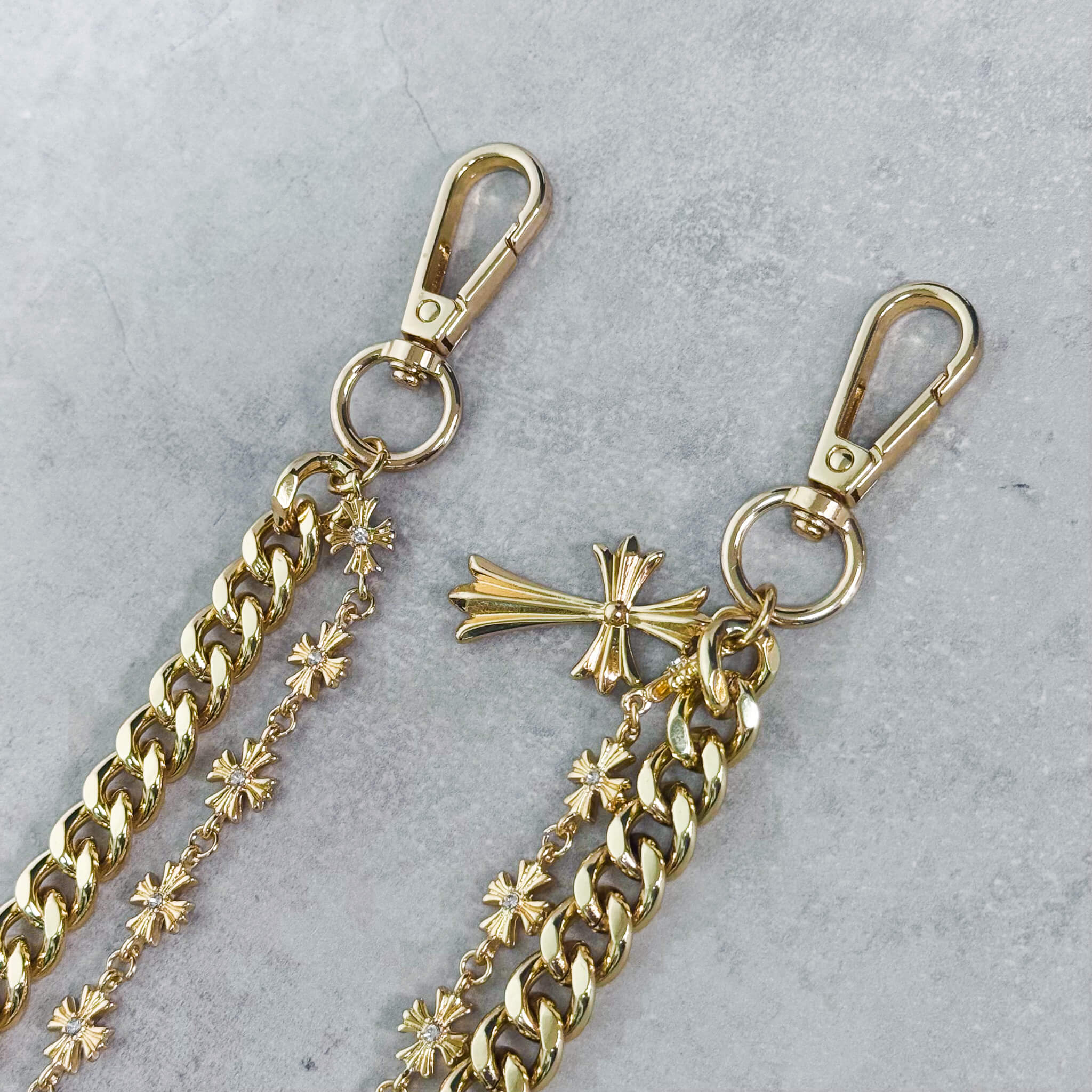 Gold Cross with Cuban Double Link Pant Chain showing clasp hardware and cross charm.