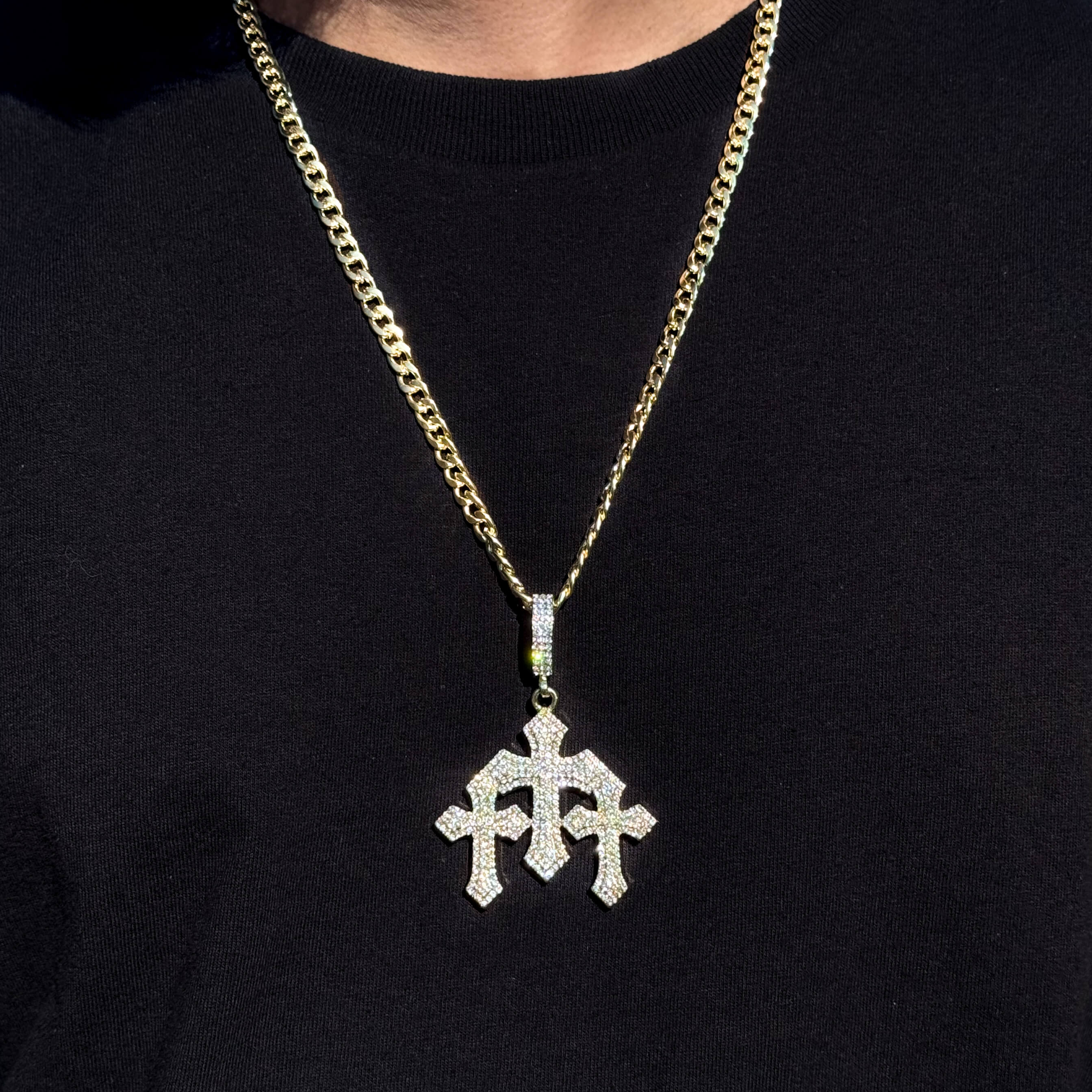 Men's large gold triple cross pendant with sparkling stones on a 5mm Cuban link necklace