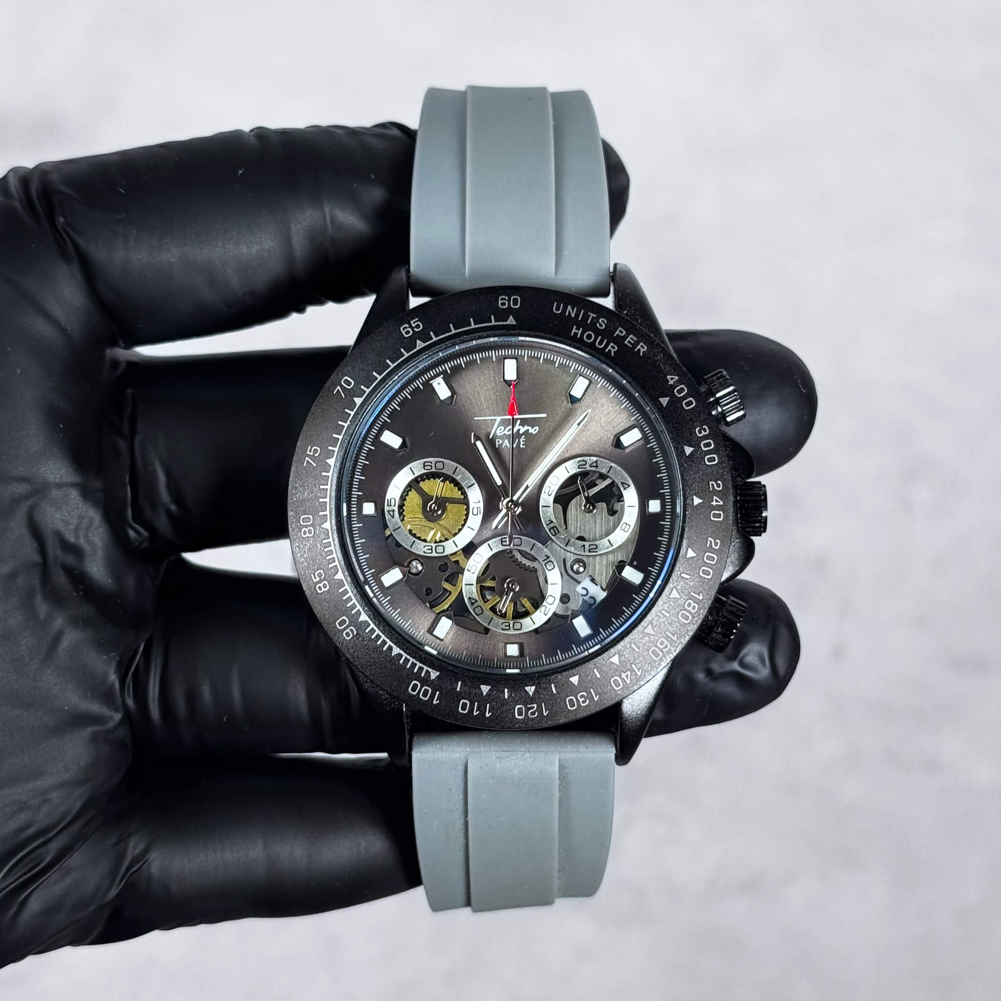 Gray-band Men’s 42mm silicone chronograph-style watch with metallic gray dial and quartz subdials.