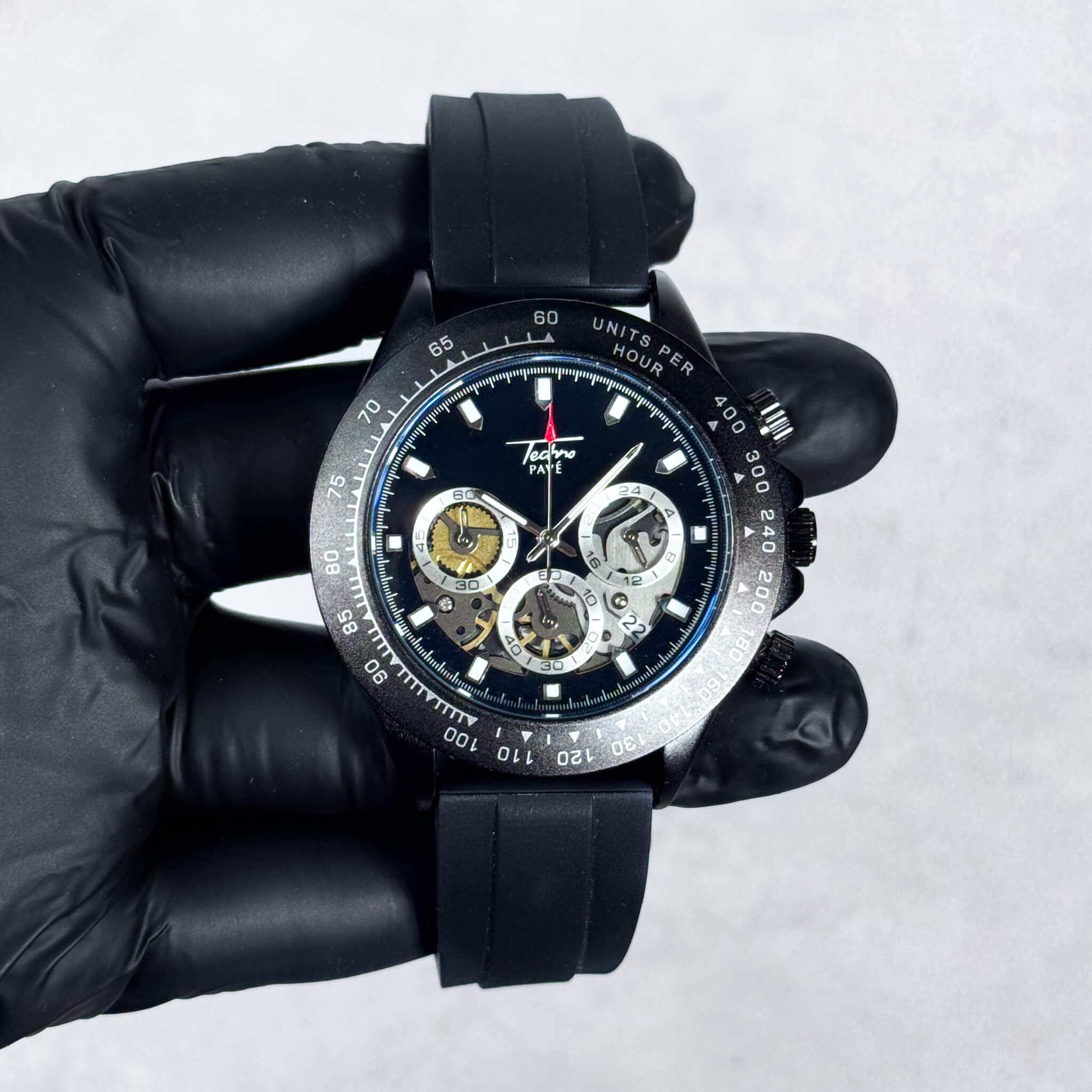 Black Men’s 42mm silicone chronograph watch with detailed black multi-dial quartz display.