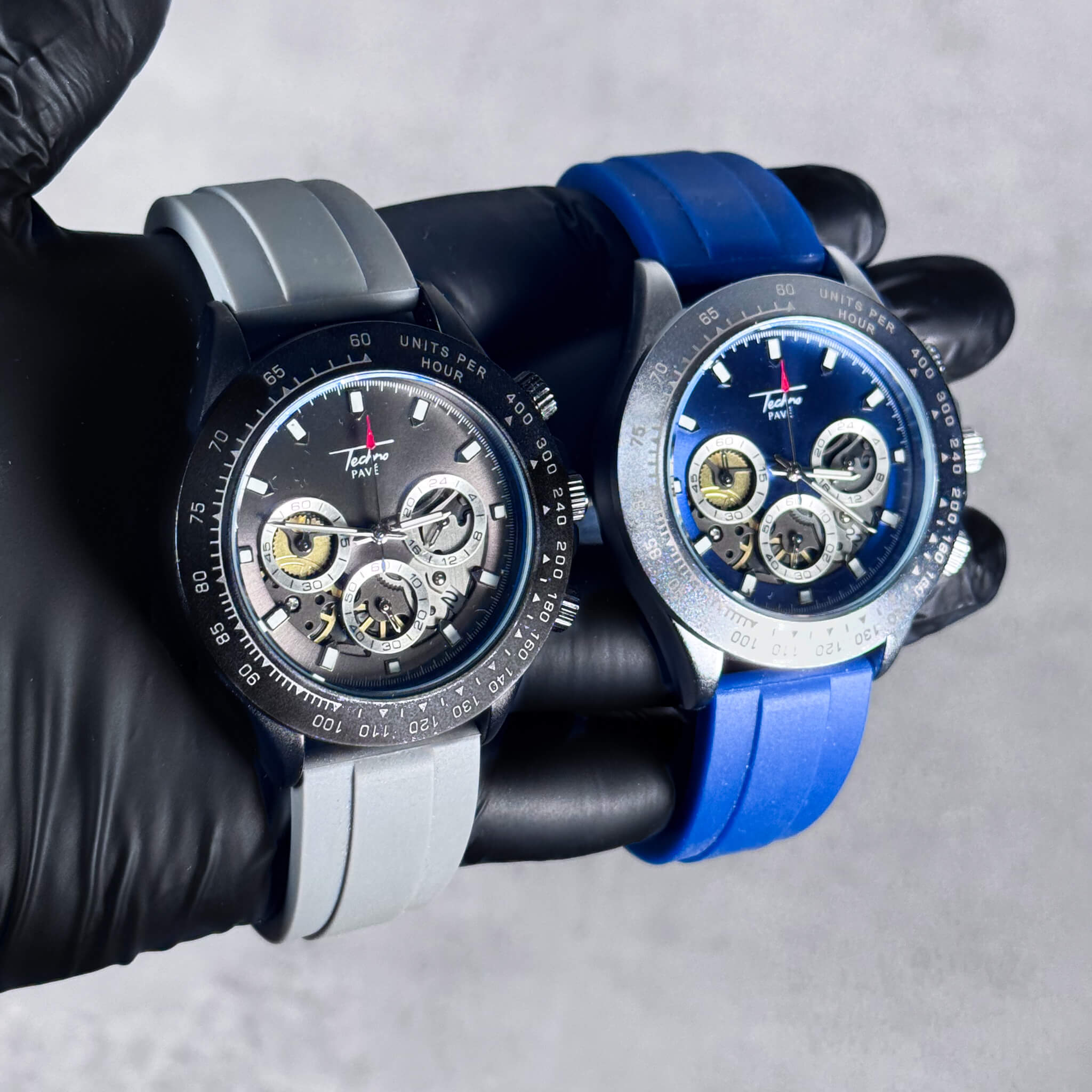 Men’s 42mm gray and blue silicone chronograph watches with detailed multi-dial quartz displays.