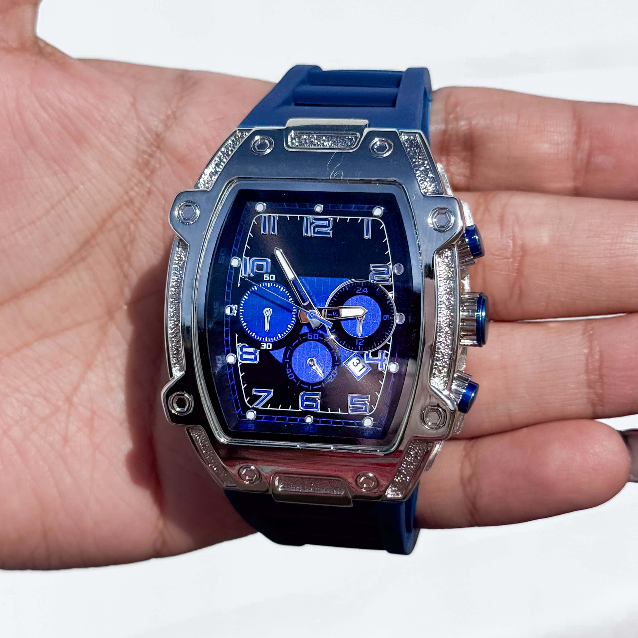 Blue Men’s 41mm tonneau silicone band watch featuring silver case and deep blue quartz chronograph dial.