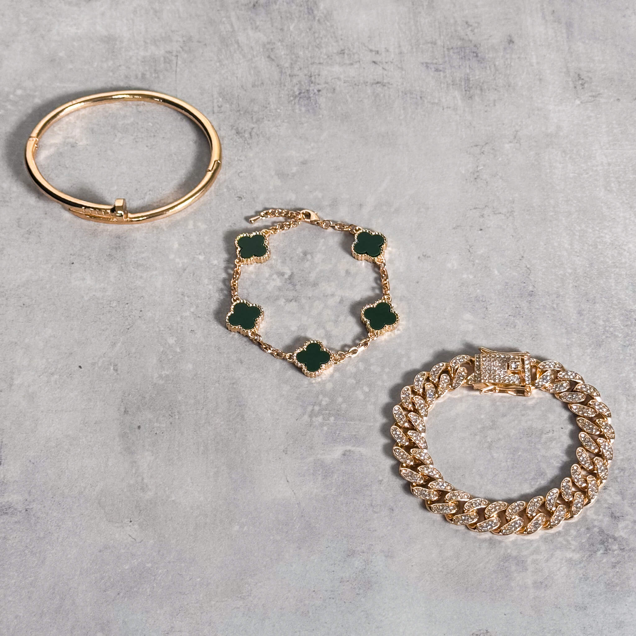 Clover with Cuban Link Bracelet 3-Piece Set featuring red enamel charms and gold