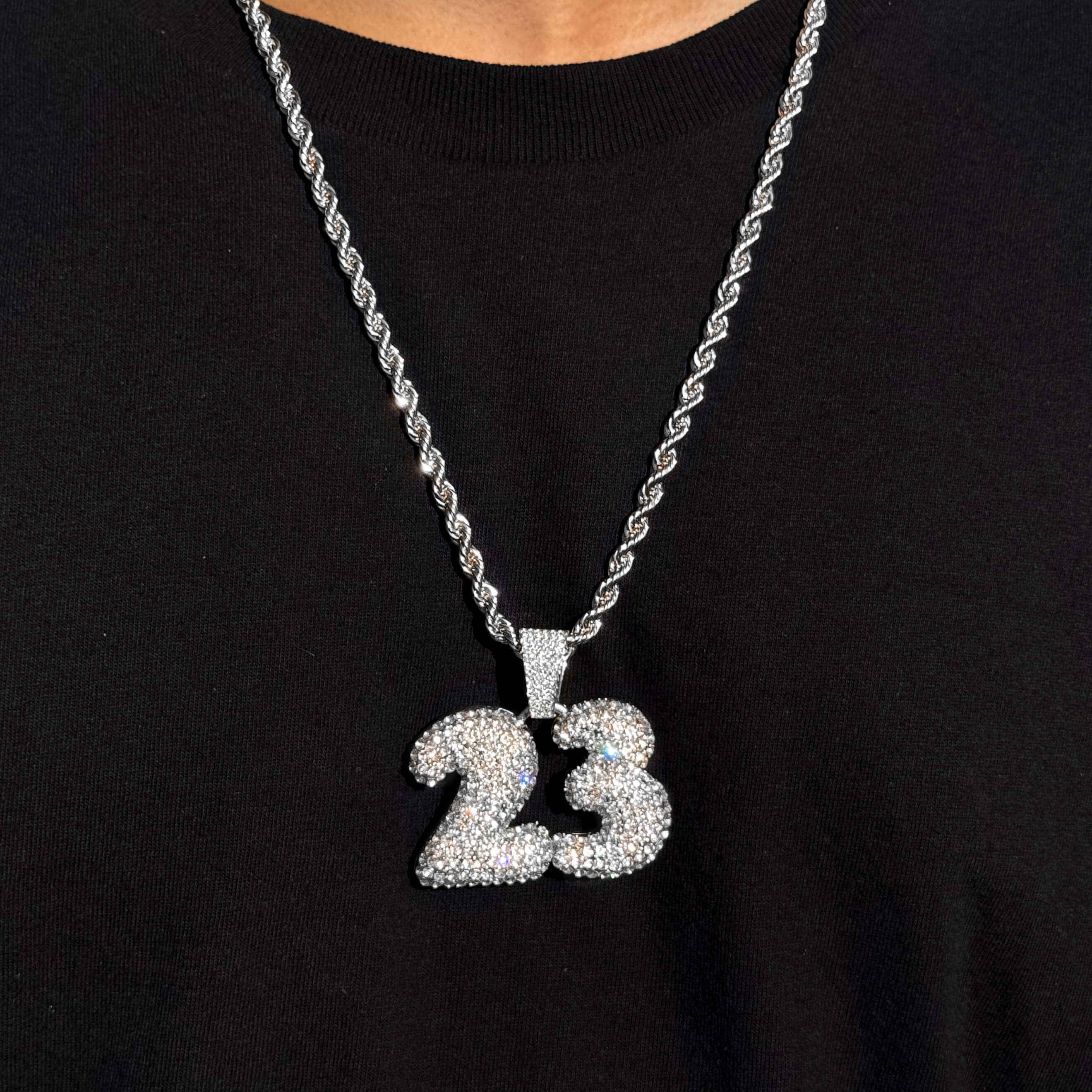Silver Men's iced out Number 23 pendant on 5mm rope chain, shimmering hip hop style necklace.