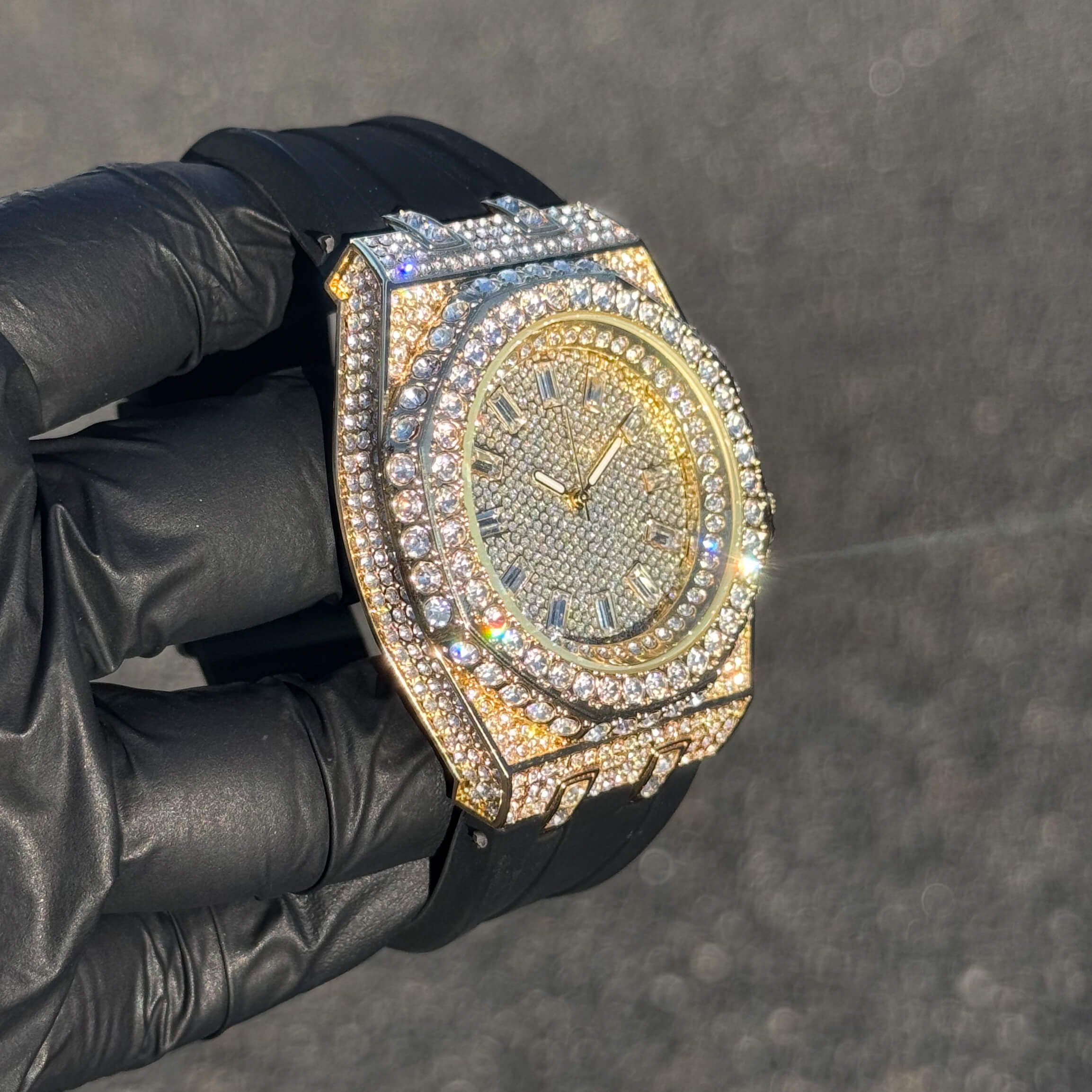 Gold men's 43mm iced out octagonal dial watch with layered diamond bezel and silicone band.