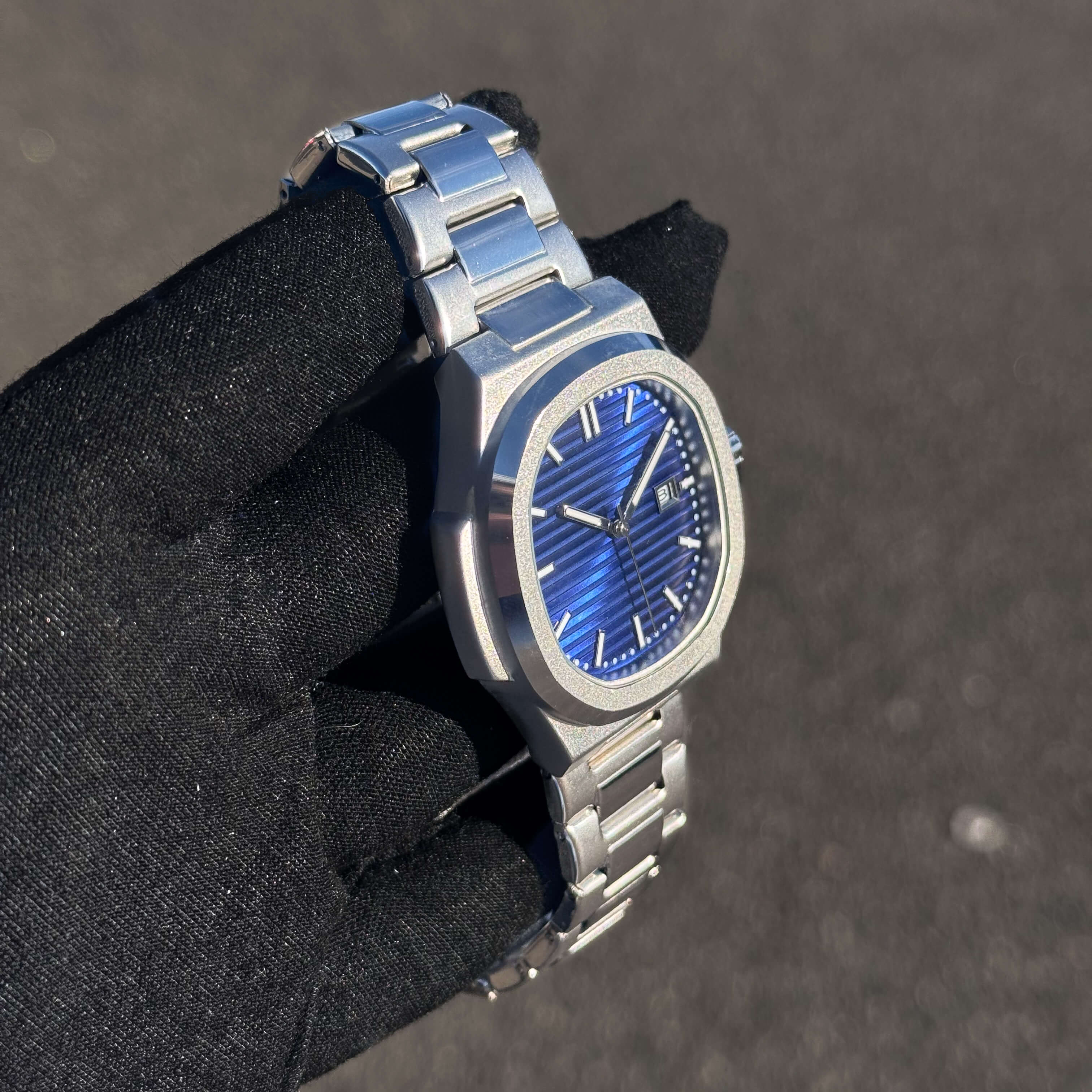 Men’s 42mm Classic Oblong Dial Watch featuring blue textured dial and integrated steel bracelet.