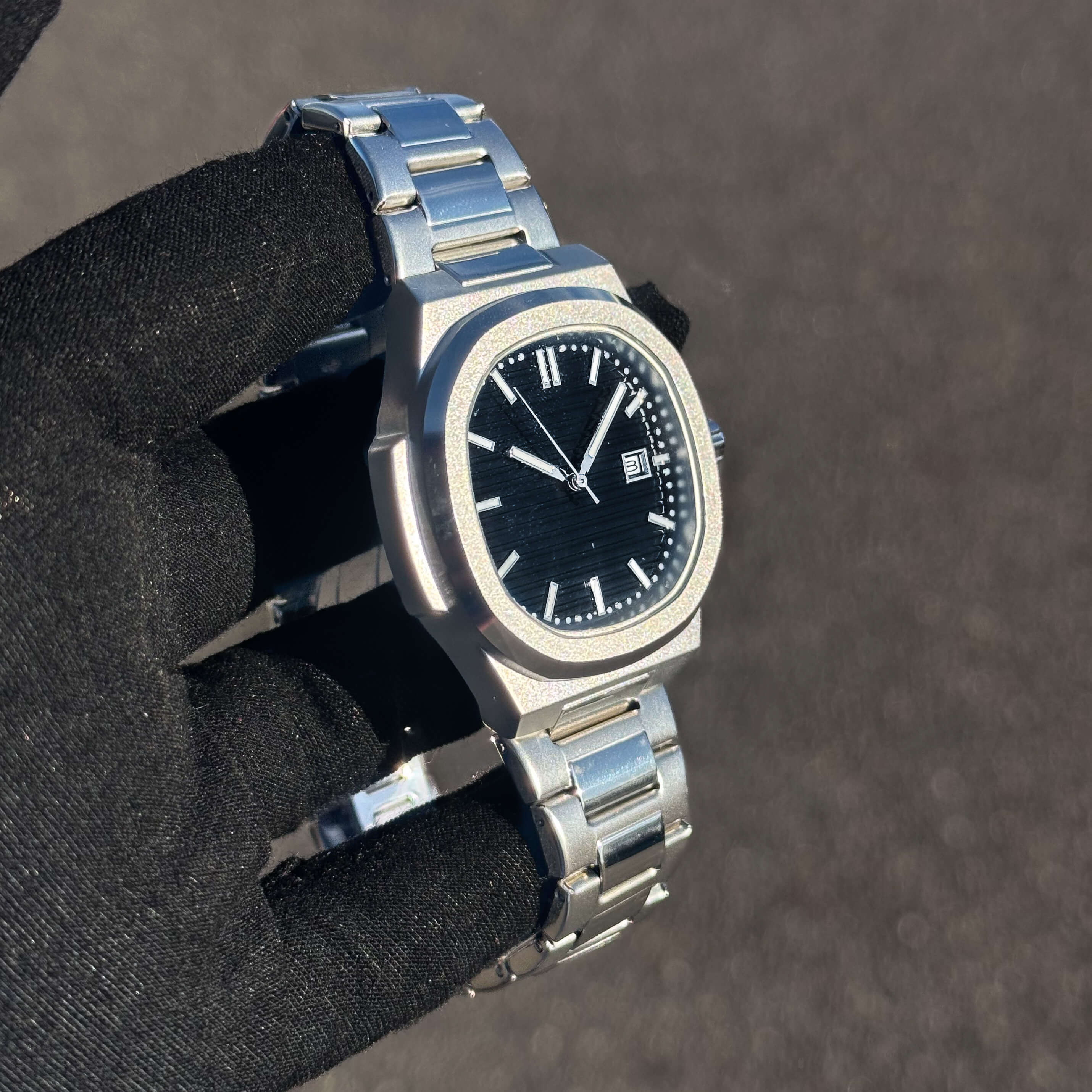 Men’s 42mm Classic Oblong Dial Watch angled view with black dial and brushed steel finish.