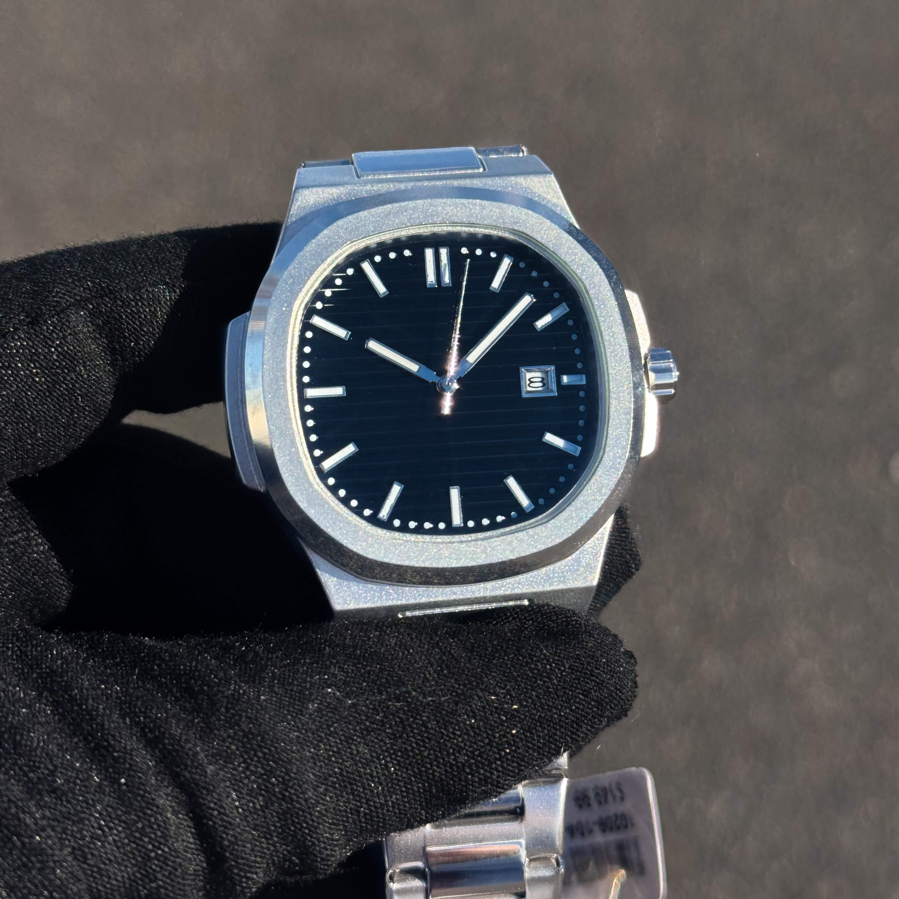 Men’s 42mm Classic Oblong Dial Watch close-up highlighting black dial, markers, and date display.