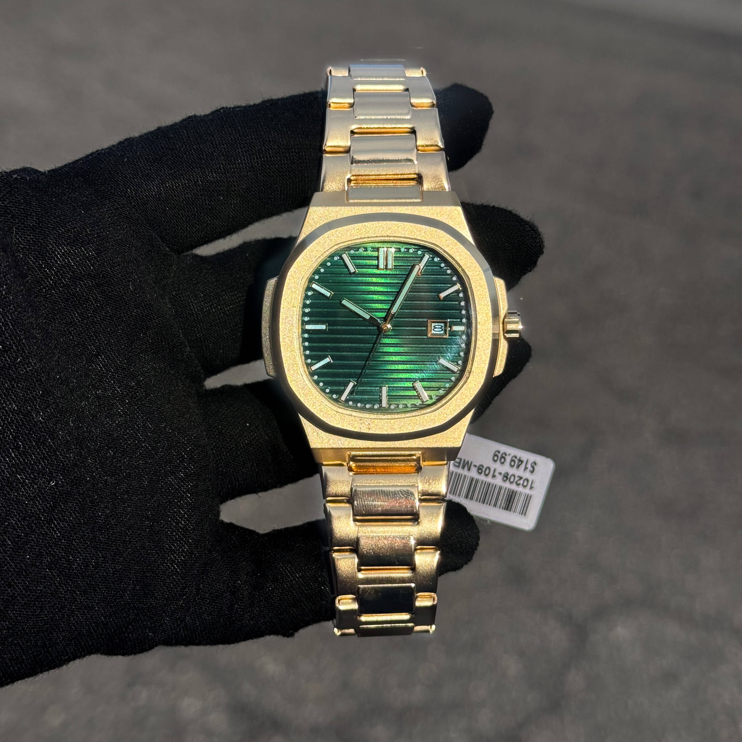 Men’s 42mm Classic Oblong Dial Watch with green textured dial, gold case, and quartz movement.