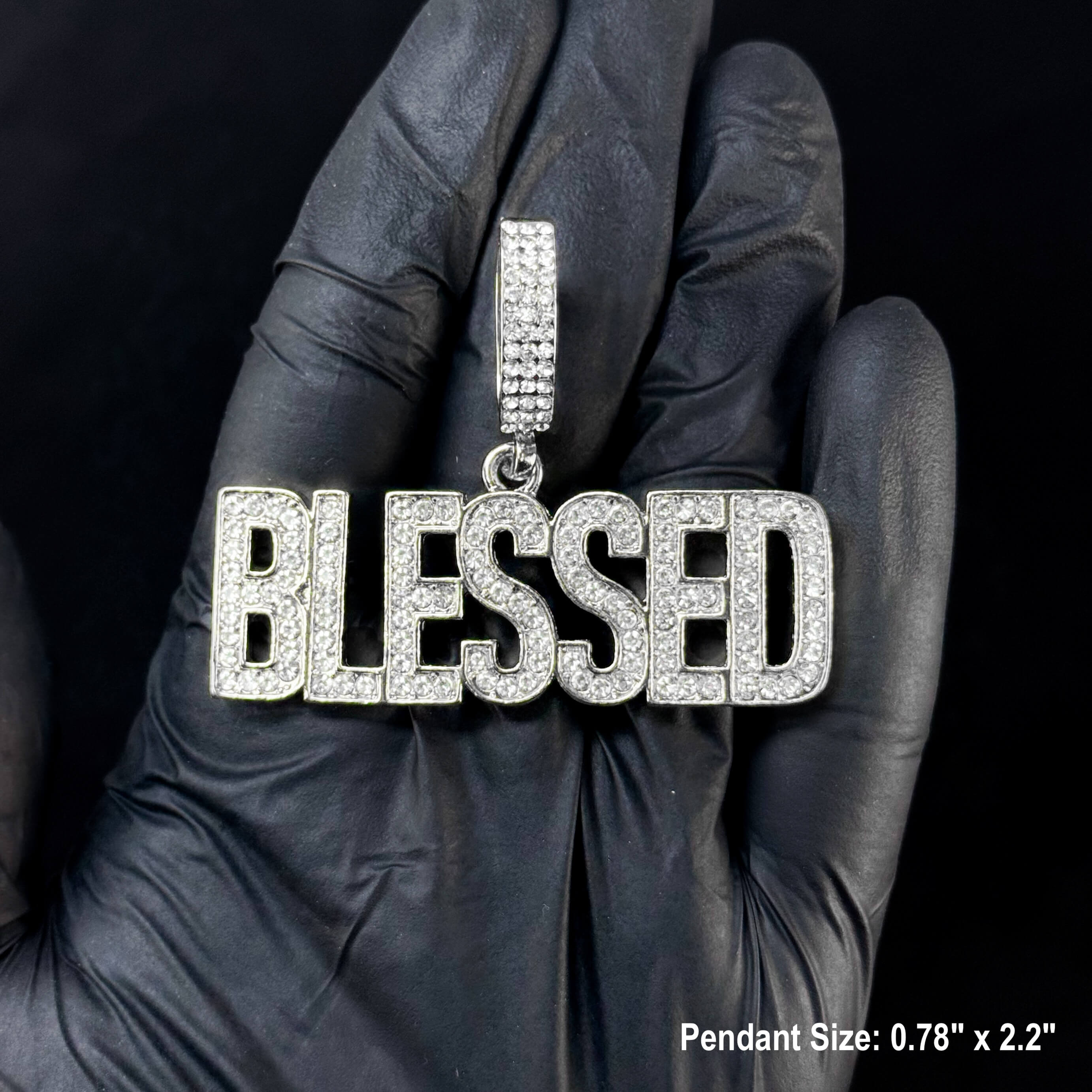 Silver Men's iced out Blessed pendant with shimmering stones displayed in detailed close-up.