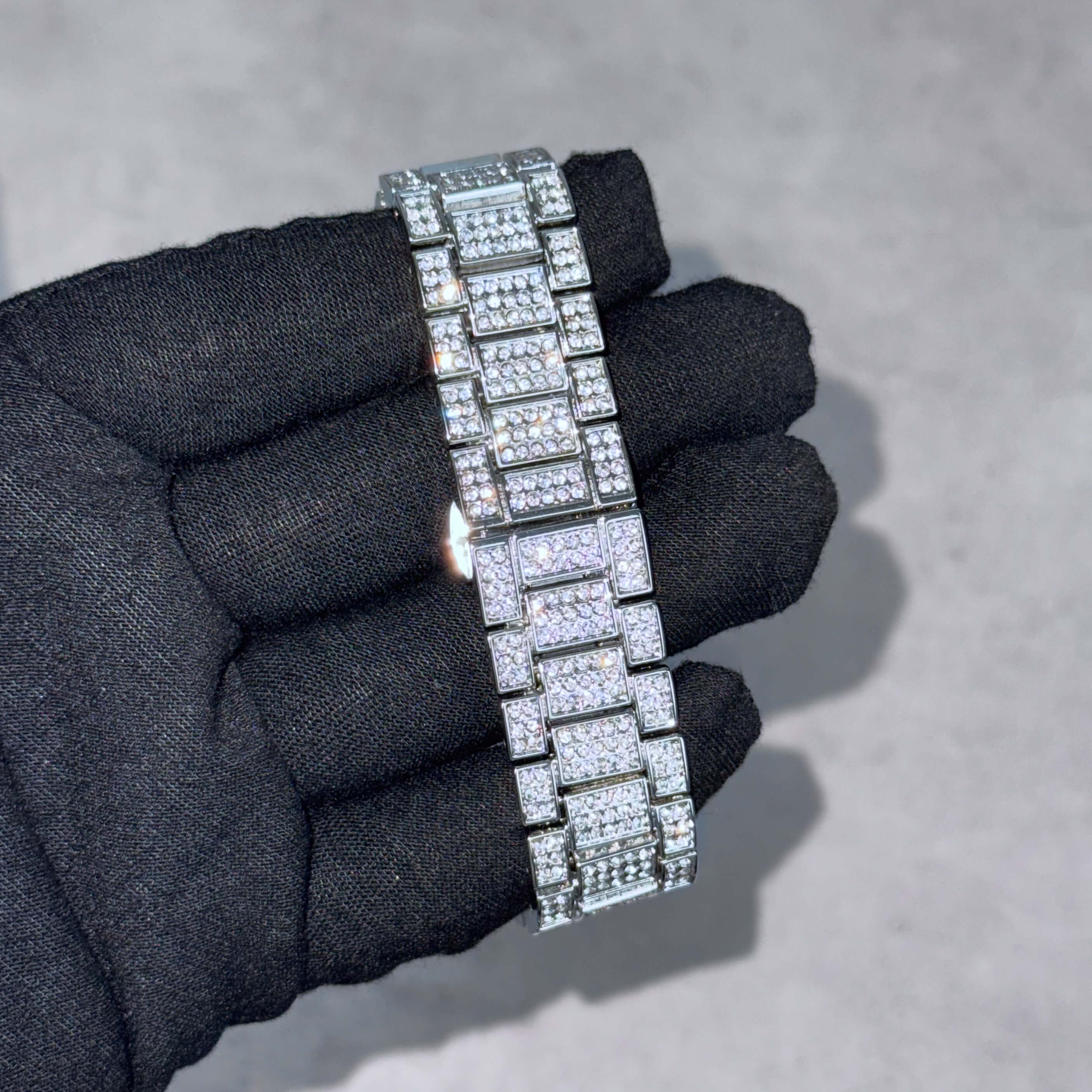 Men's 30mm fully iced-out silver watch band with square links and pavé stones for luxury style.