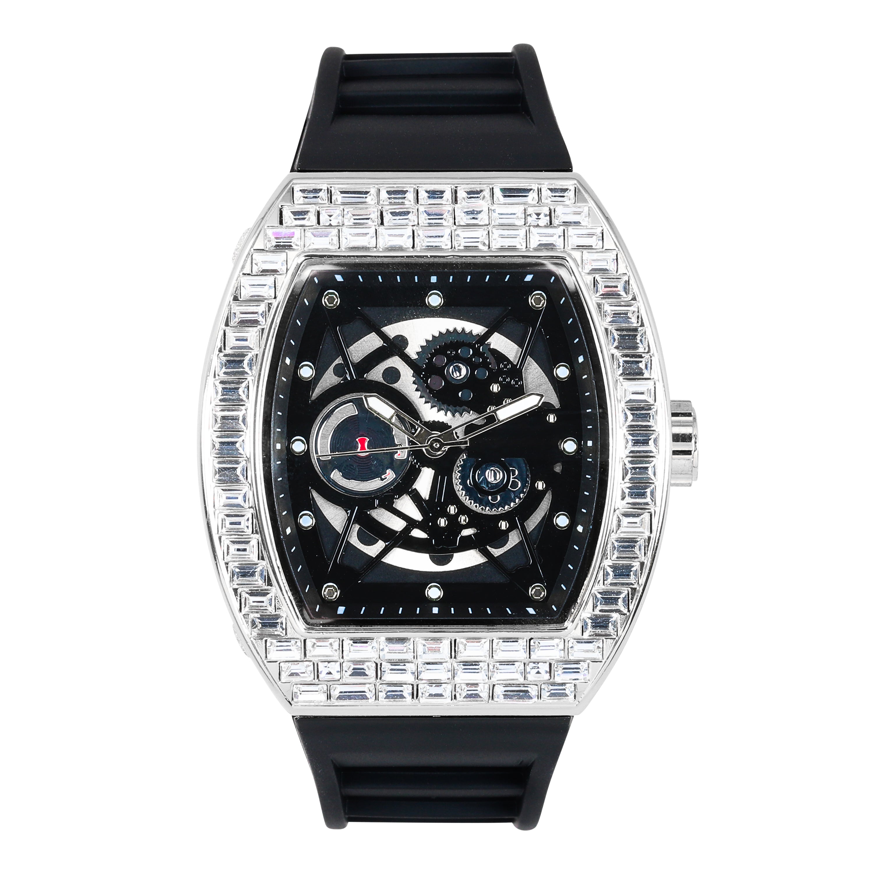 Silver men’s luxury iced watch with baguette crystal bezel, open-gear dial, and black silicone strap.