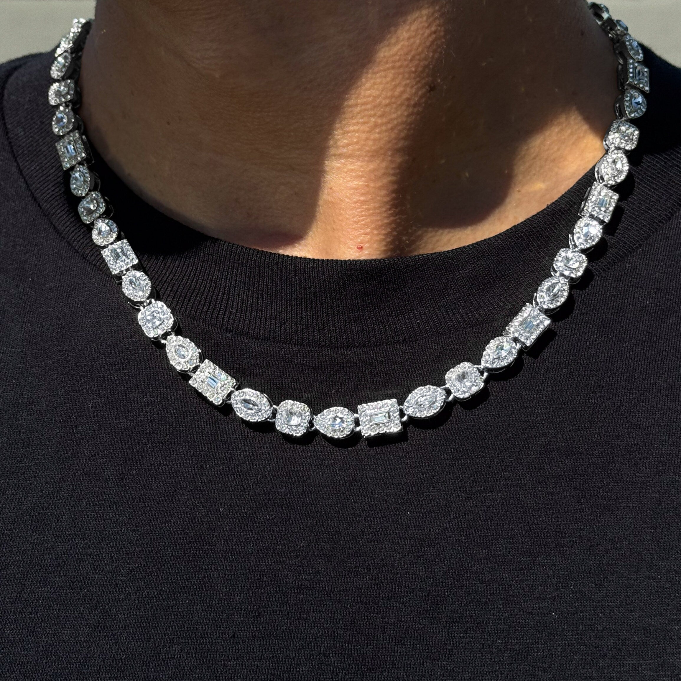 Men's Iced Out 6mm Mixed Stone Cluster Chain Necklace in silver featuring brilliant mixed-cut stones worn on model.
