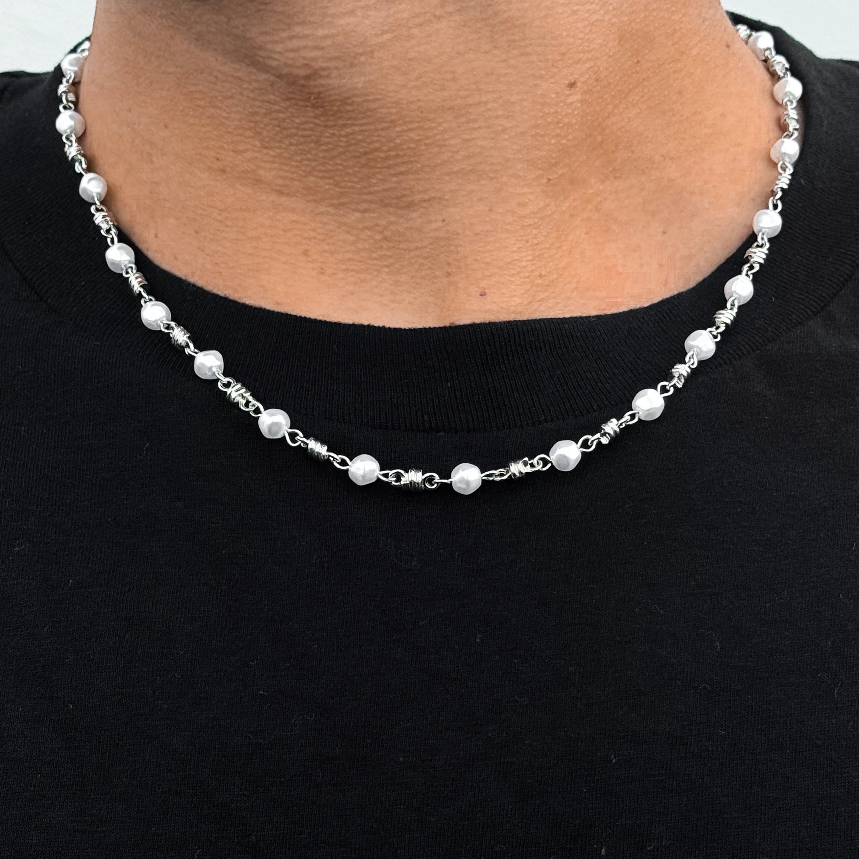 Men’s 6mm pearl barbed wire necklace in silver, worn to show the 20-inch length and detailed links.