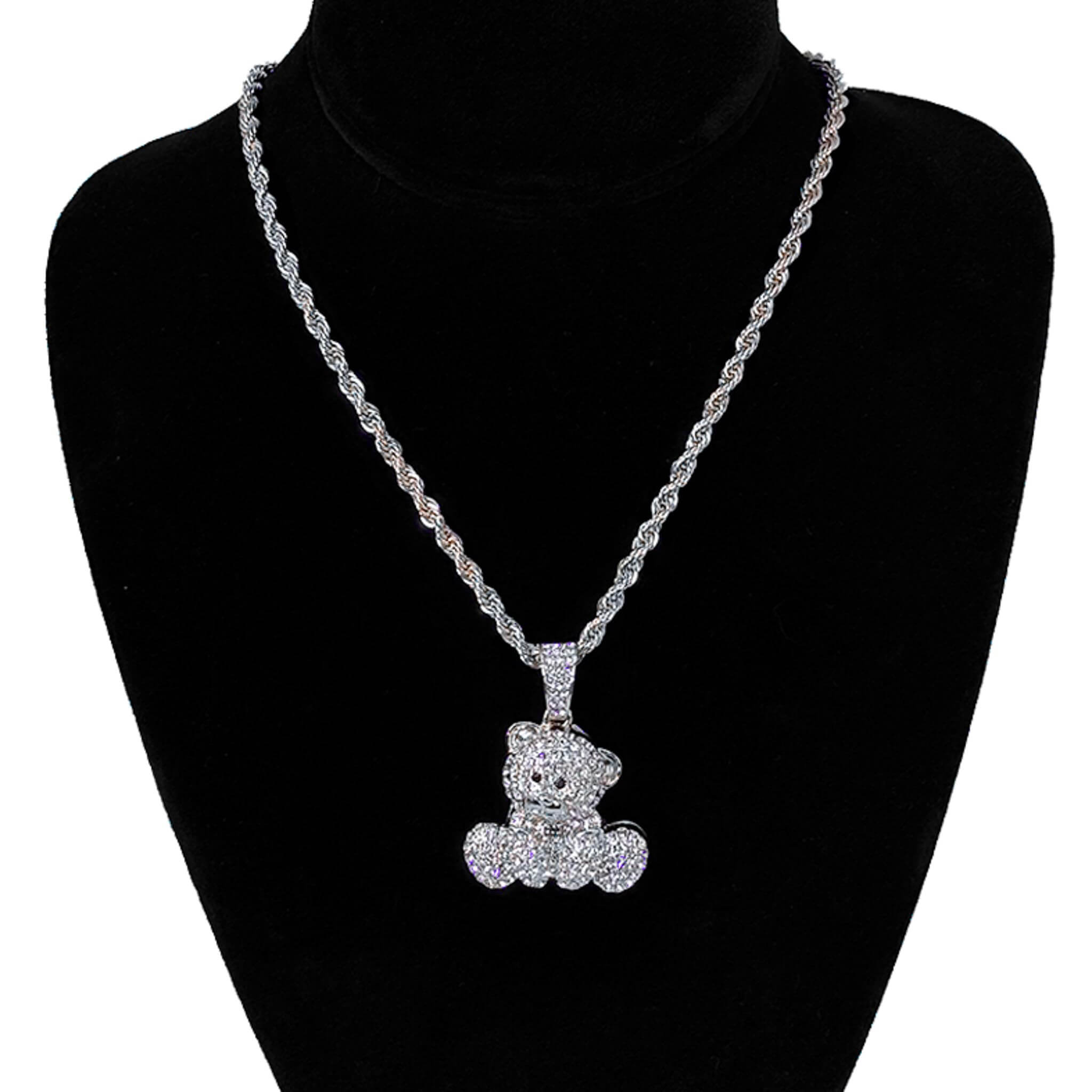 Ladies 32mm iced-out silver bear pendant necklace with 4mm rope chain shown on black display bust.