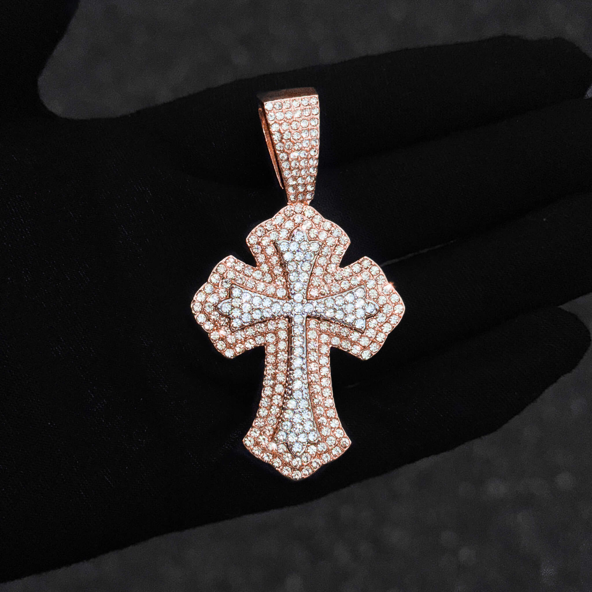 Rose gold 42mm iced-out men’s cross pendant with pavé clear stones and polished detailing.