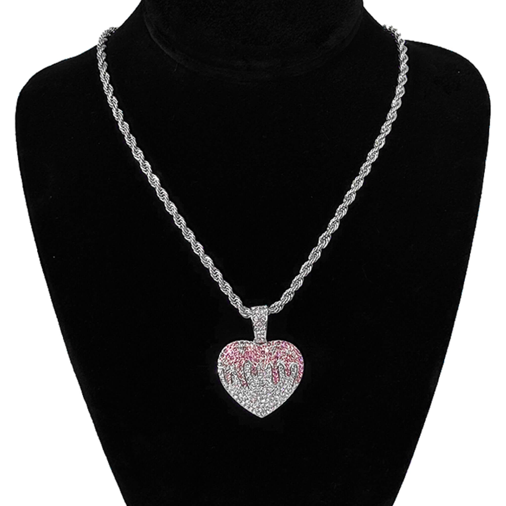 Detailed close-up of silver iced-out Heart pendant covered in sparkling stones for women’s jewelry.
