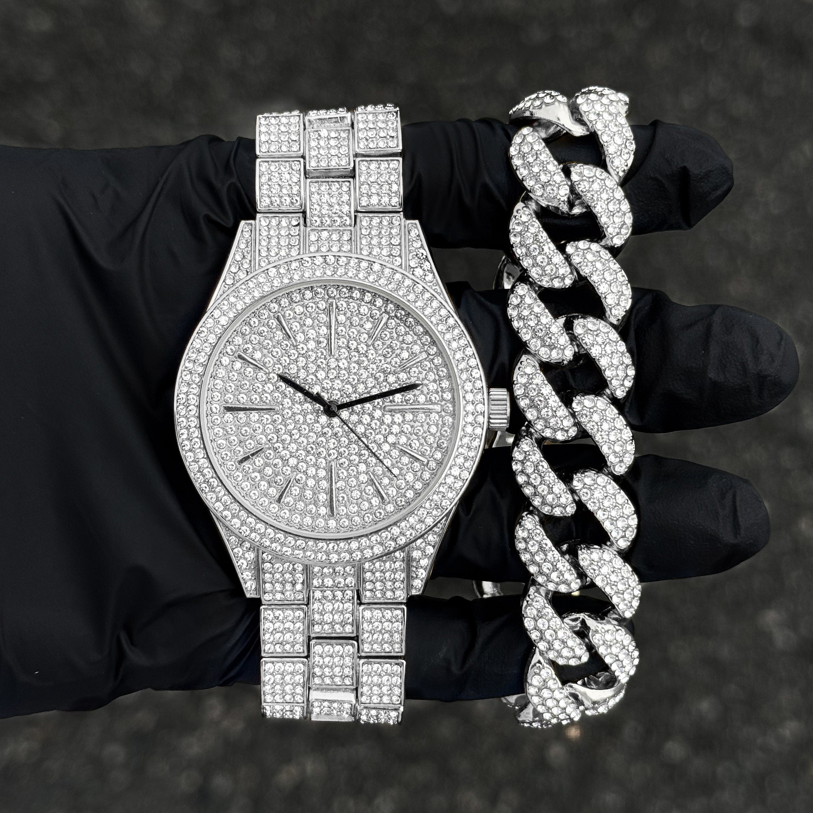 Men's 42mm luxury iced diamond watch with silver Cuban bracelet, fully iced dial and bezel.