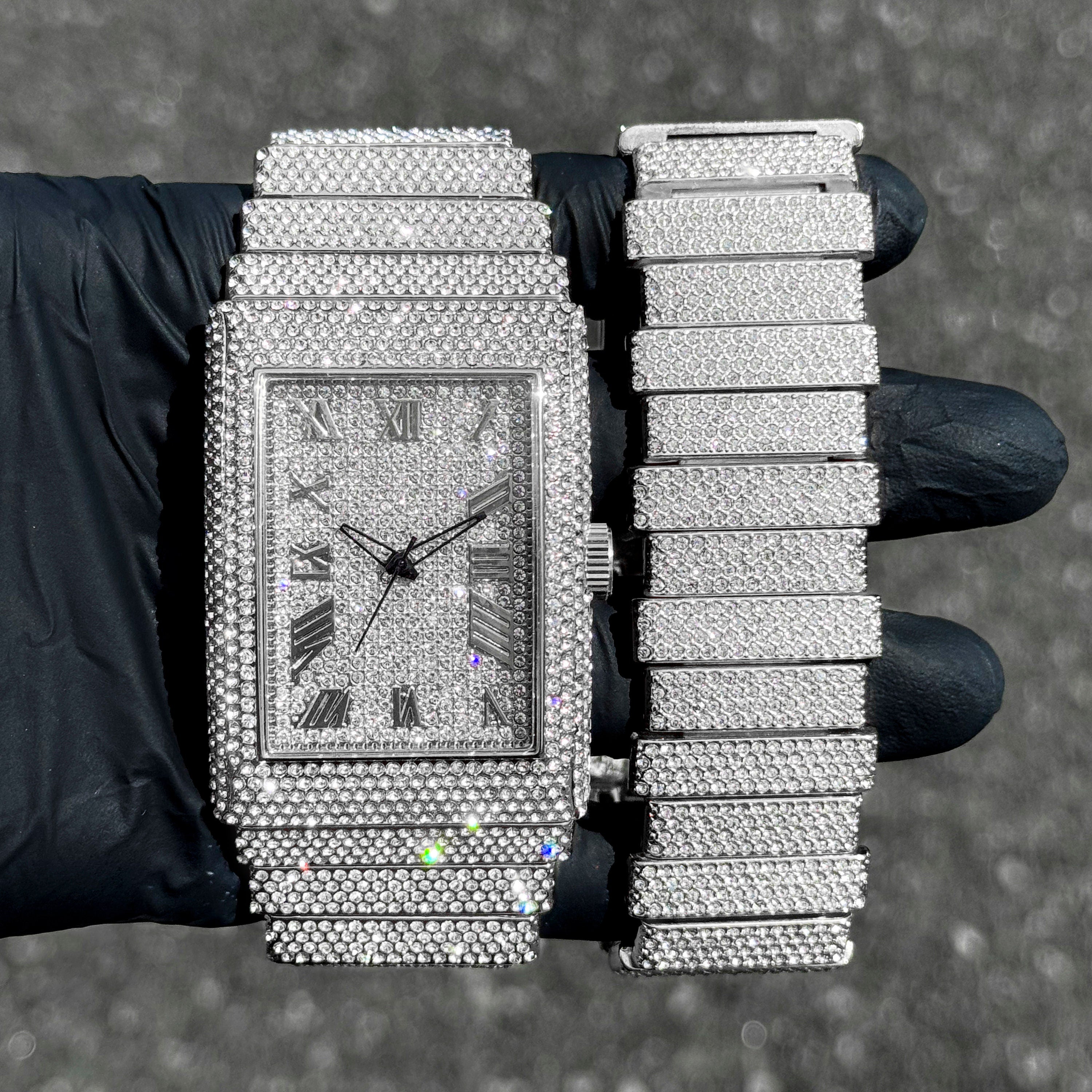 Men's 40mm silver fully iced out diamond watch with matching staggered link bracelet set.