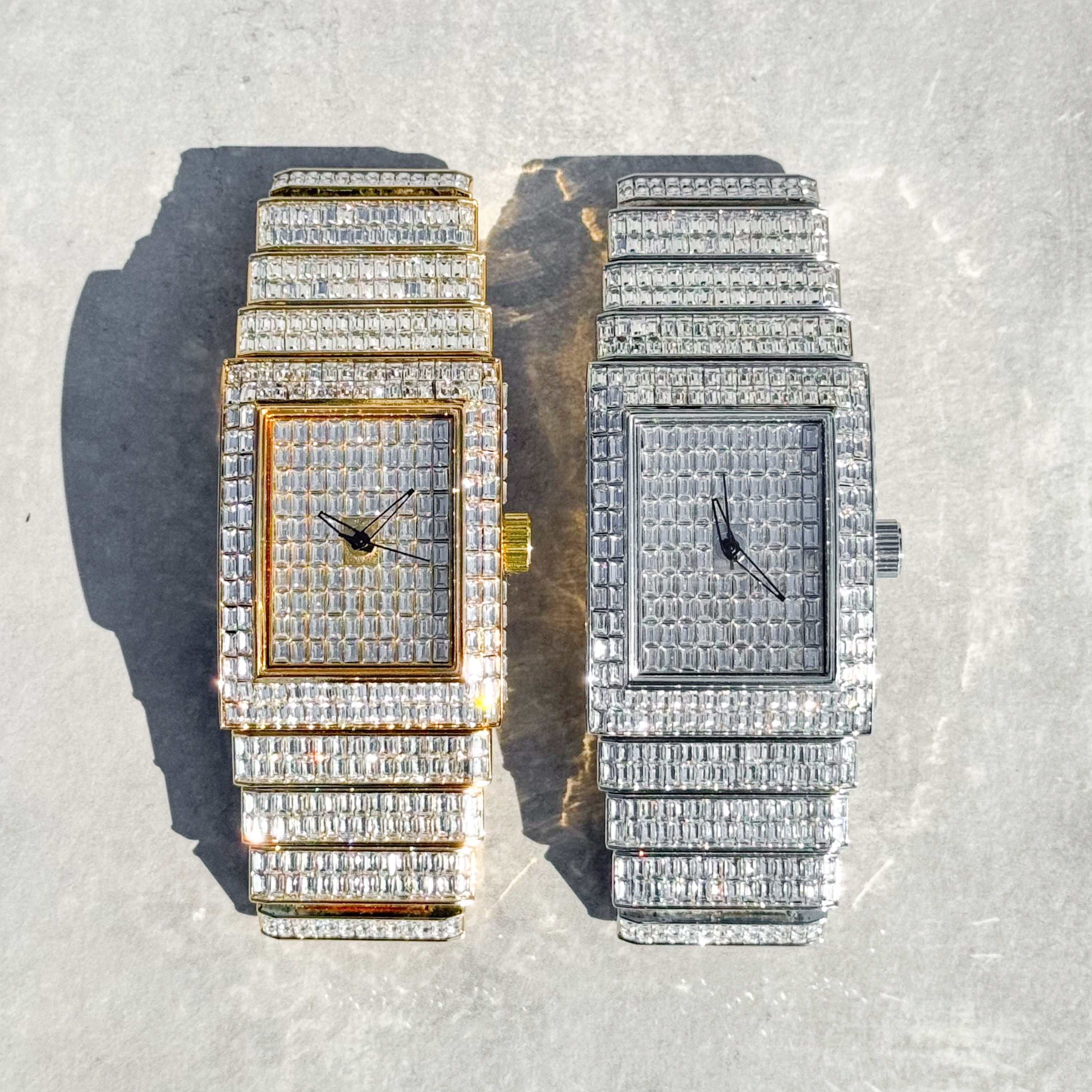 Men's 40mm fully iced out rectangle diamond watch in silver and gold tone with baguette dial and band.