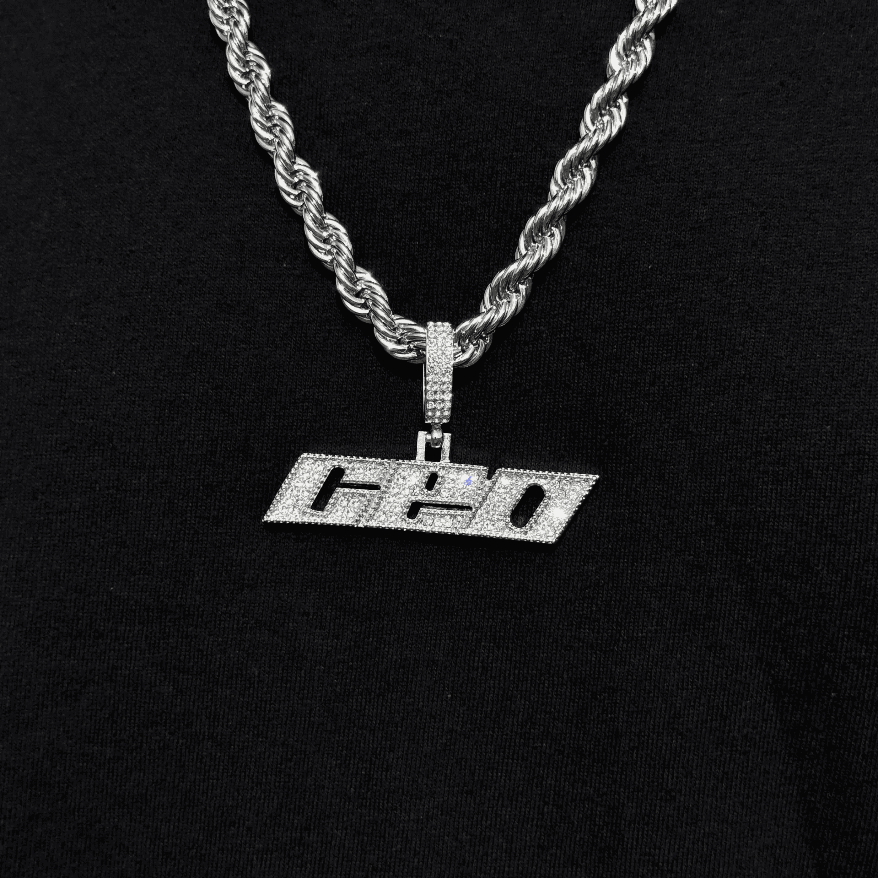 Silver iced out CEO pendant with sparkling crown detail, large men's hip hop necklace.