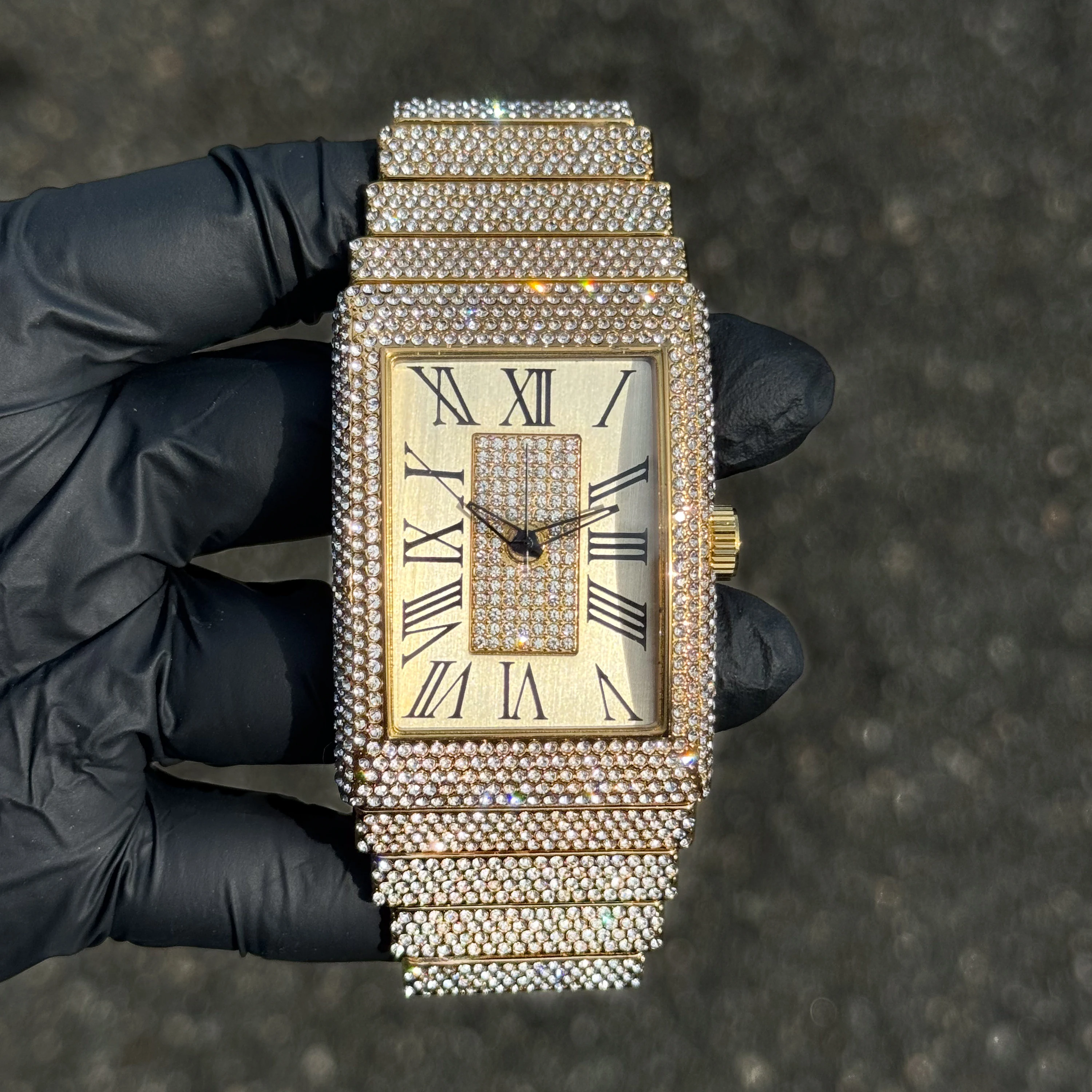 Gold 40mm men’s rectangle diamond watch with fully iced bezel and band, Roman numeral dial.