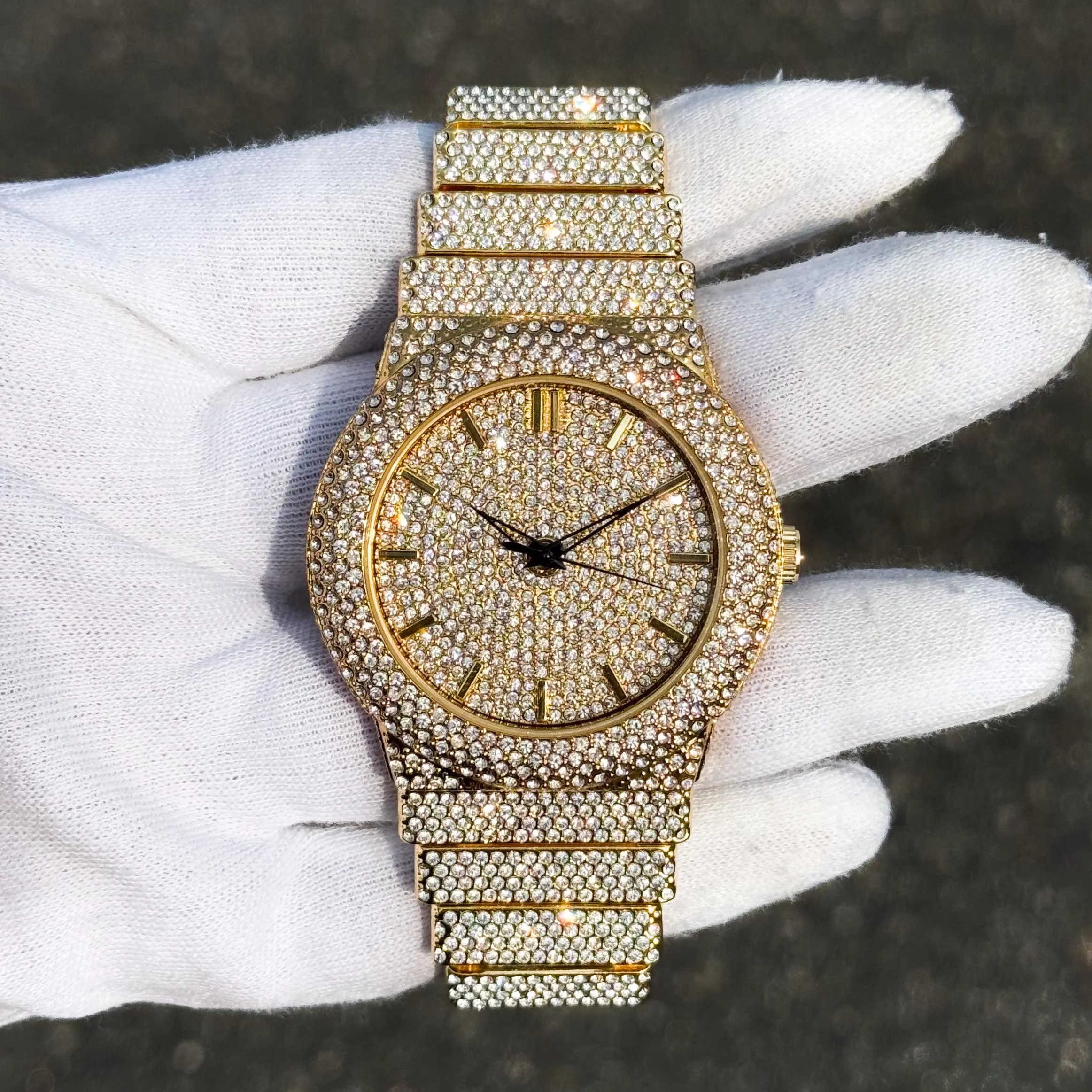 Gold men’s 46mm luxury diamond watch featuring a fully iced-out round dial and crystal-encrusted bezel.