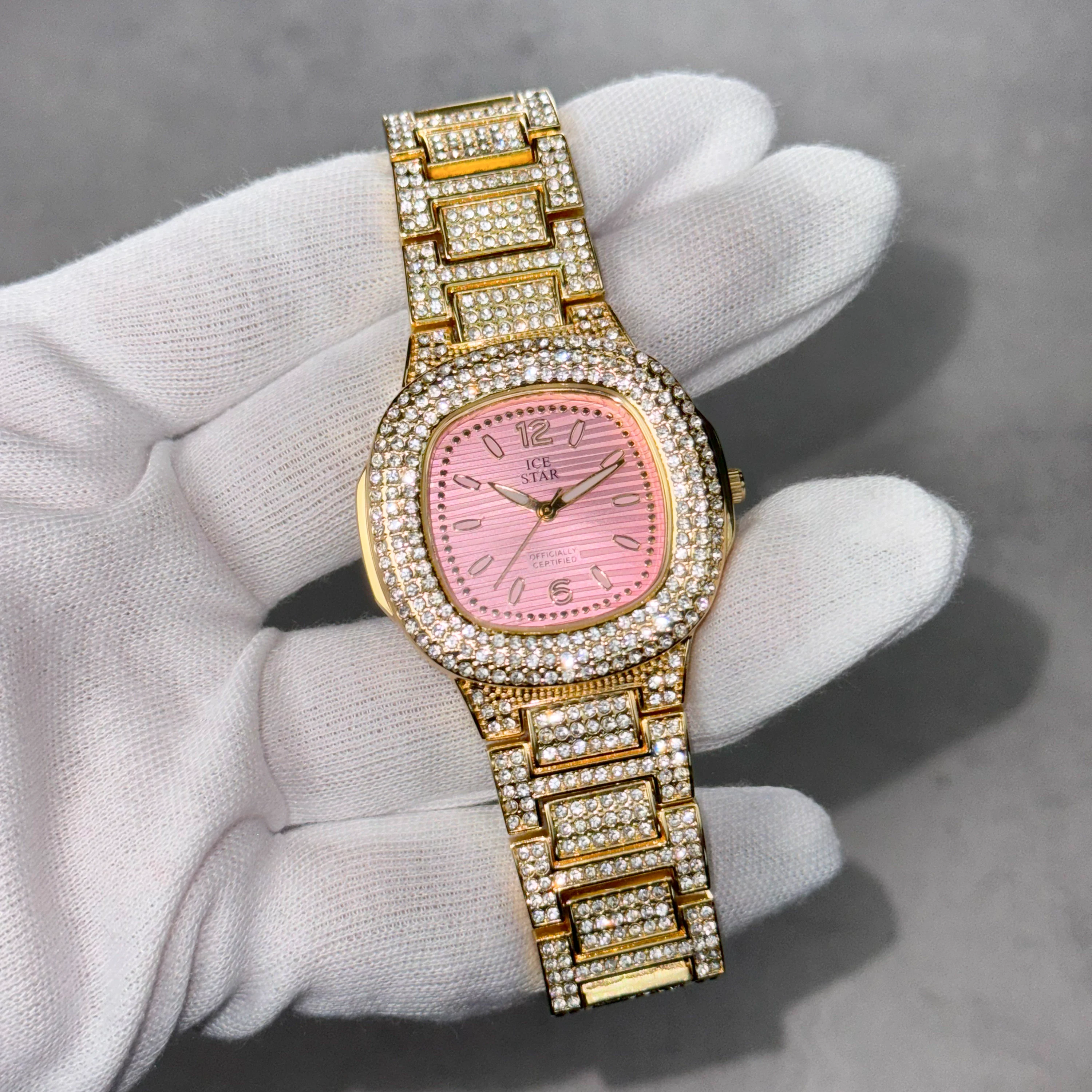 Gold Women’s 39mm square diamond watch with pink numeral dial and crystal-covered band.