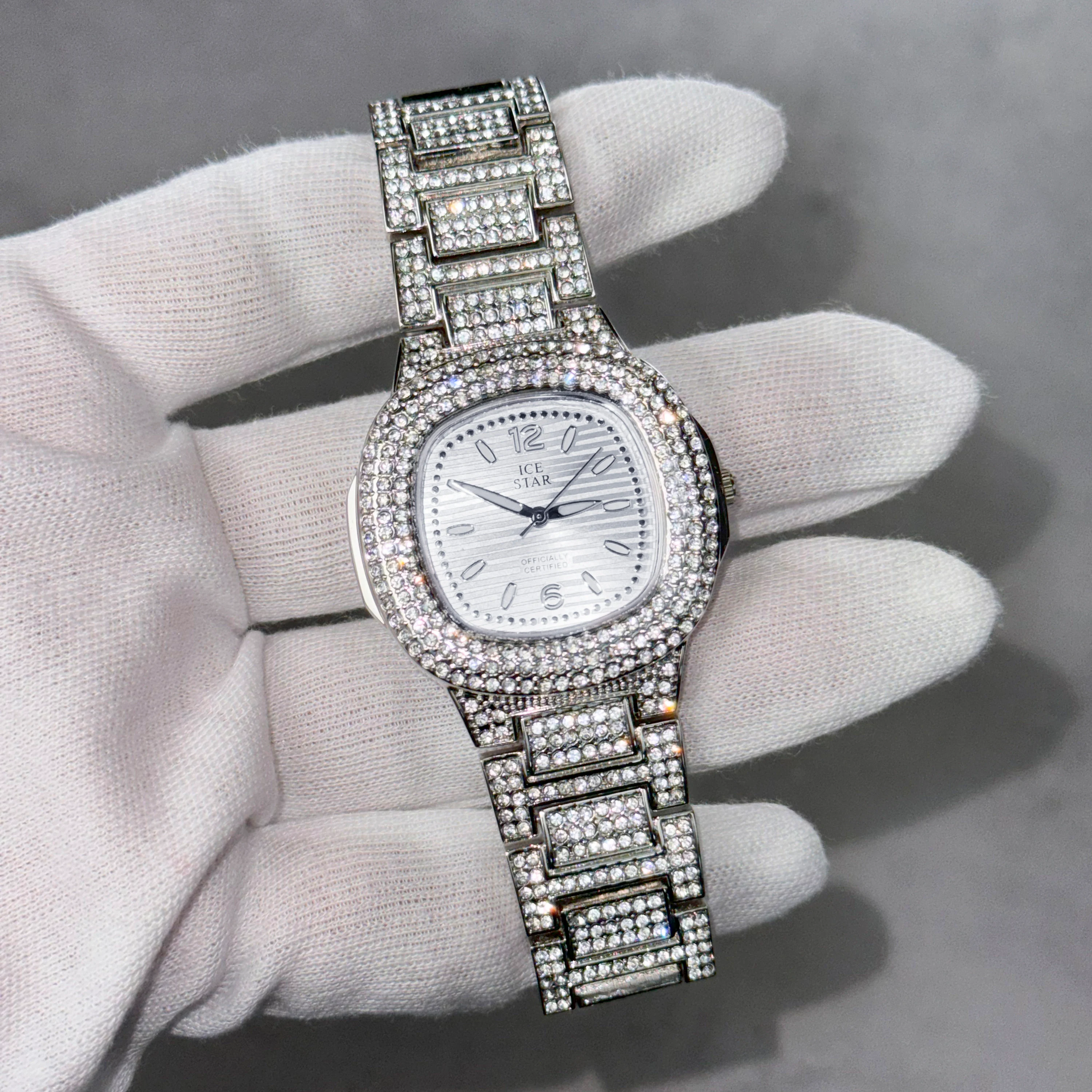 Silver Women's 39mm square diamond watch featuring numeral dial and full iced-out bracelet design.